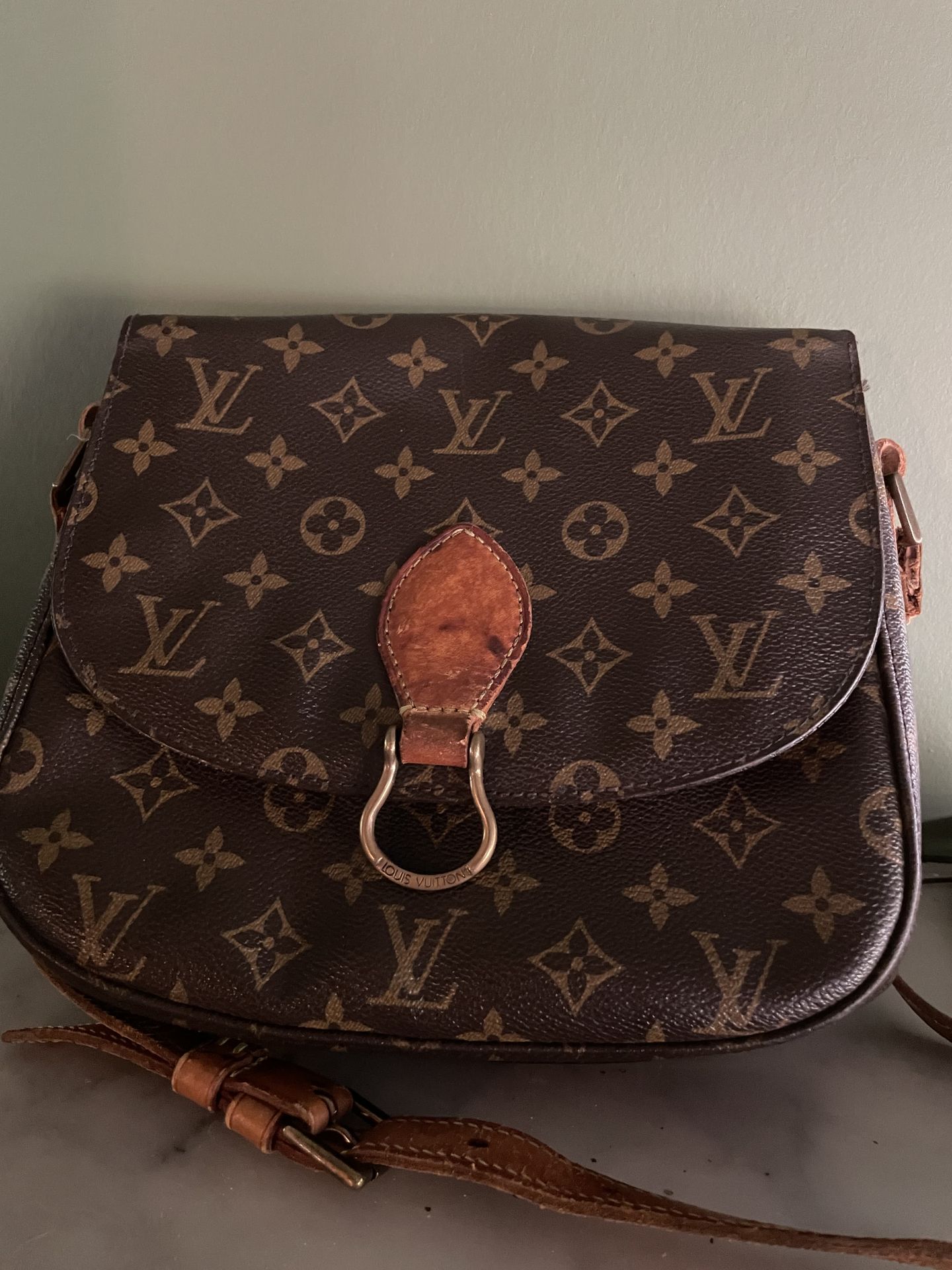 Null Louis VUITTON satchel in monogrammed coated canvas, the shoulder strap and &hellip;
