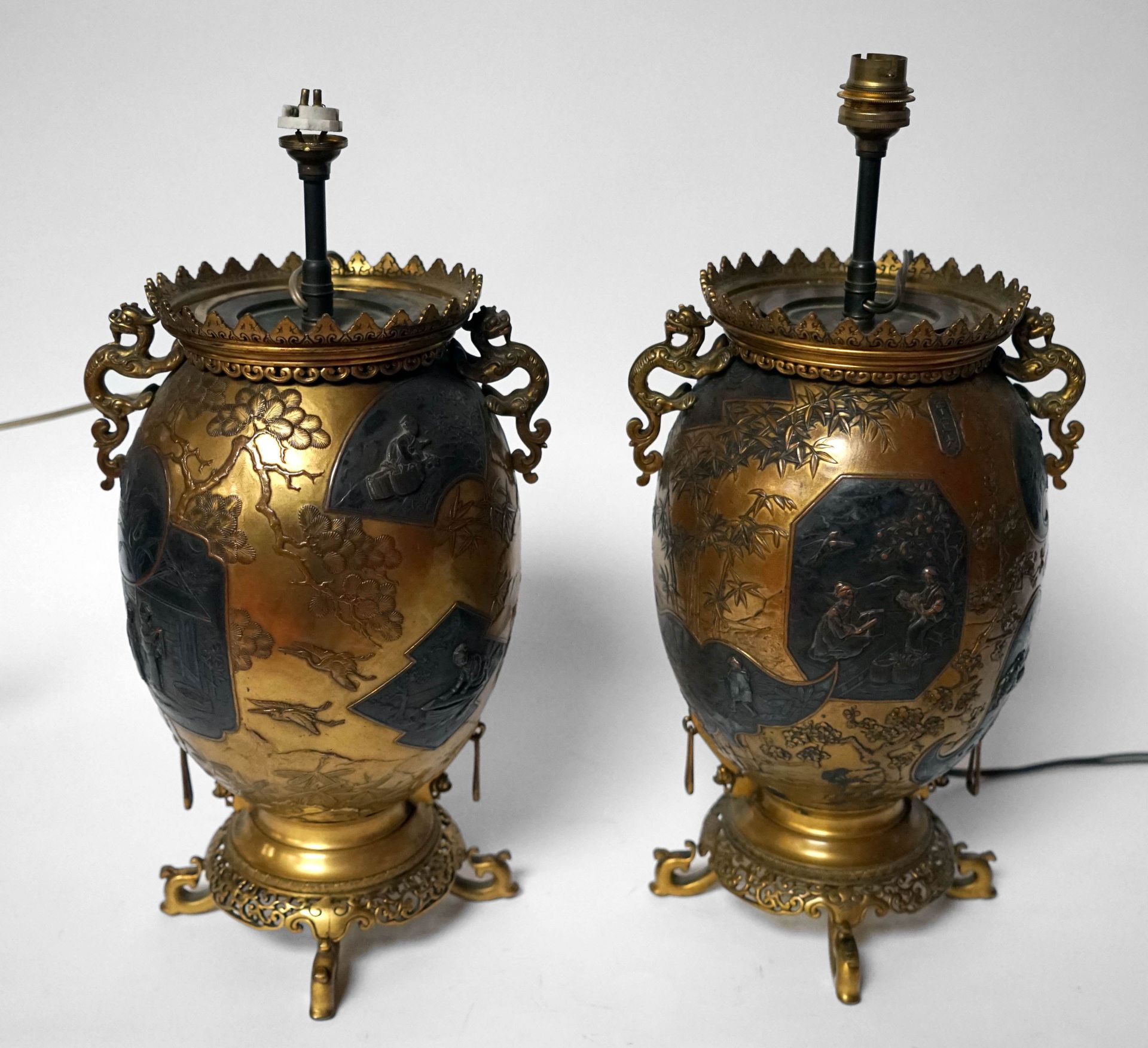 Null F. BARBEDIENNE. Pair of lampstands in bronze with a brown and gilded patina&hellip;