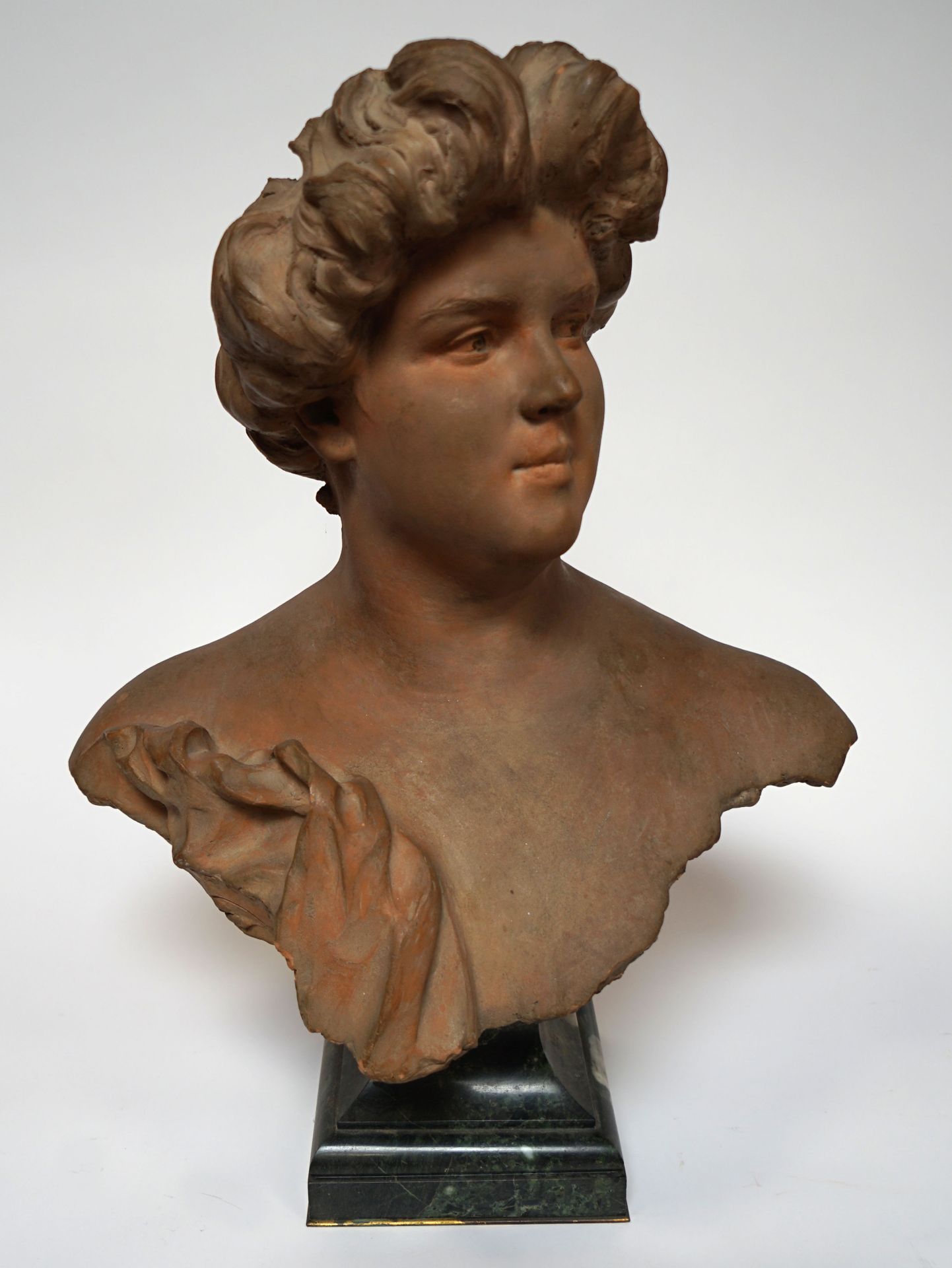 Null Denys Pierre PUECH (1854-1942). Terracotta bust on a green marble pedestal &hellip;
