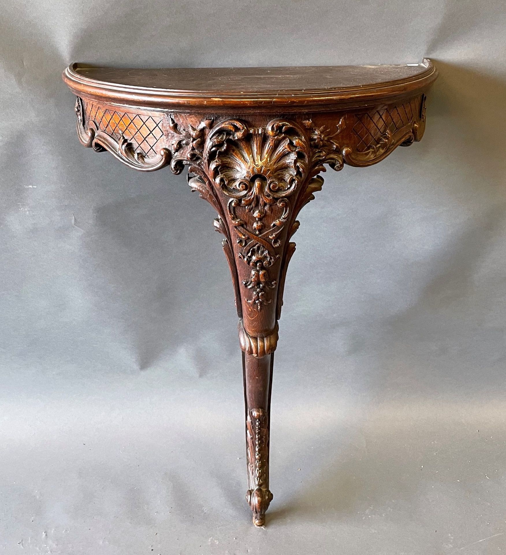 Null A small half-moon console in natural wood carved with shells and floral scr&hellip;