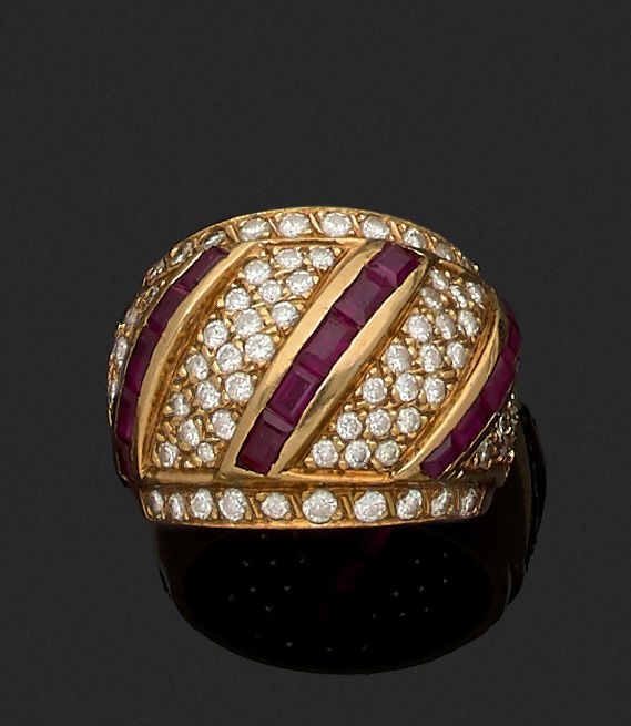 Null 750 karat yellow gold bombe ring set with three lines of caliber rubies on &hellip;