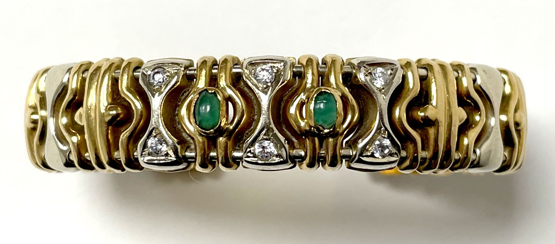 Null 750密耳黄金手镯，镶有小钻石和两颗椭圆形祖母绿。重量 16,2 g