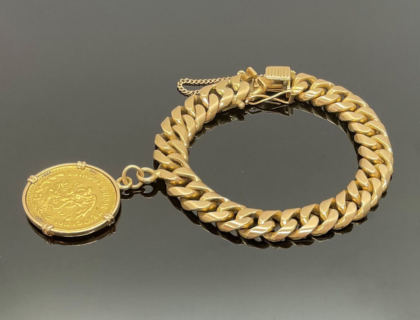 Null 黄金手镯，750密耳，持有一枚20墨西哥比索的金币，1959年。安全链。重量103克