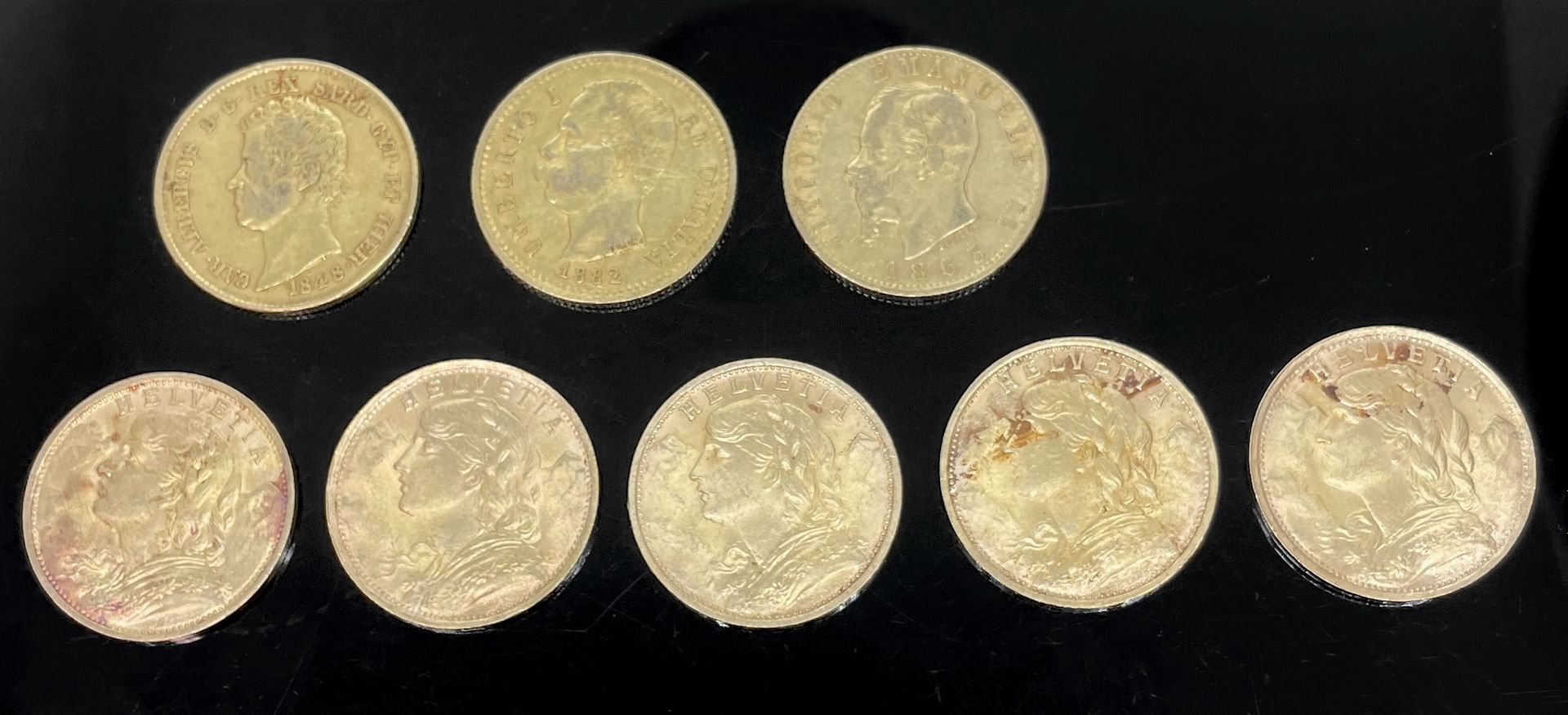 Null Otto monete d'oro: 5 pezzi 20 fr. Svizzera e 3 pezzi 20 lire Italia