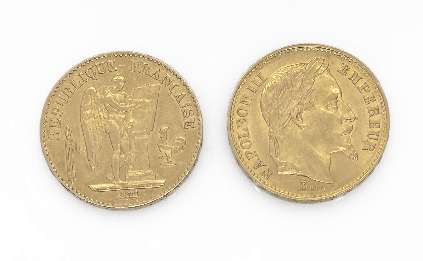Null 两枚20法郎金币，1869年拿破仑三世的桂冠和1876年带翅膀的天才。