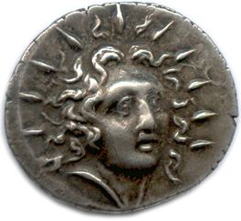 Null ISLAND OF CARIES - RHODES 88-42. Radiused head of Helios, front. R/. Flower&hellip;