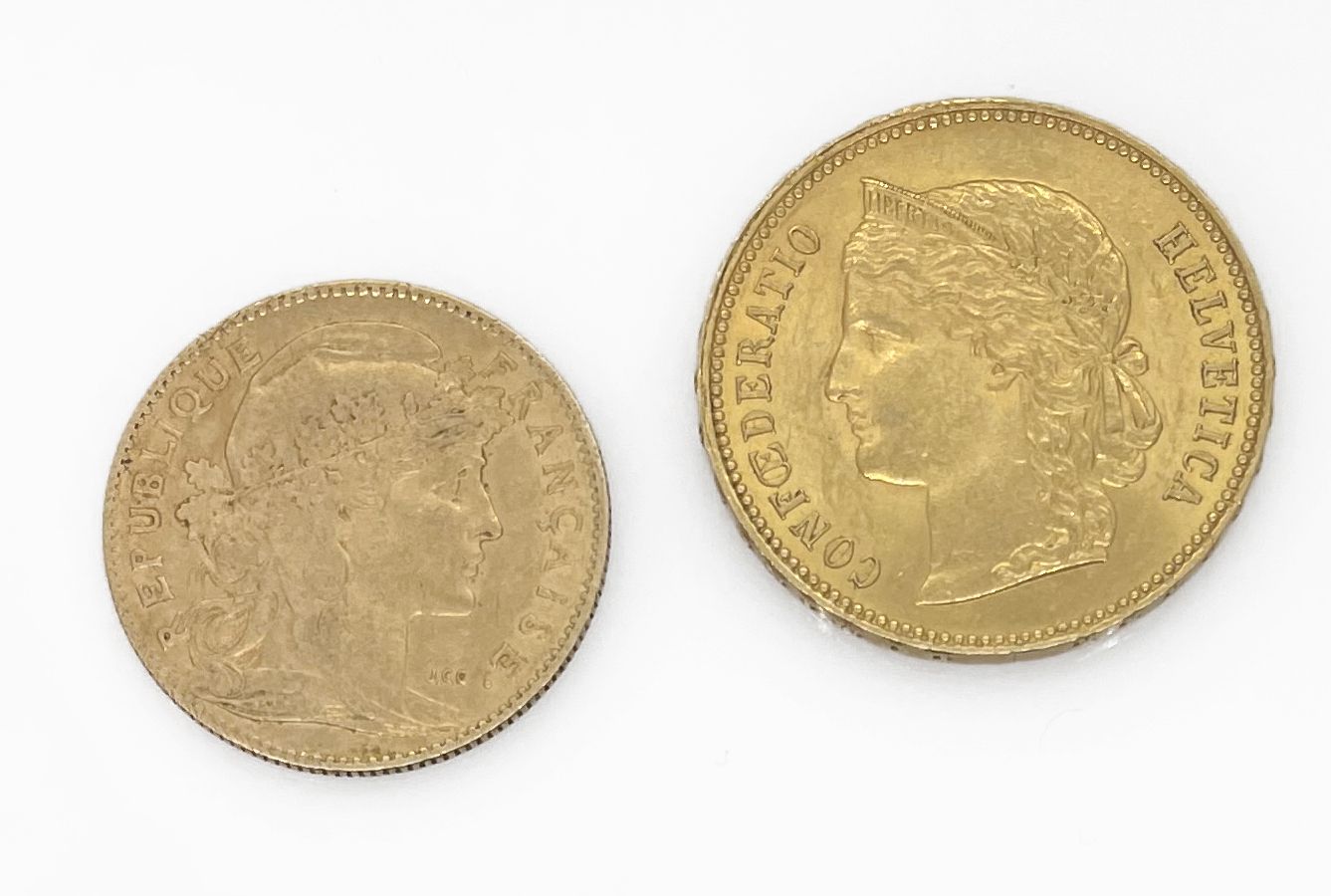 Null 两枚金币：一枚1896年的20瑞士法郎硬币和一枚1907年的10法郎马里安金币