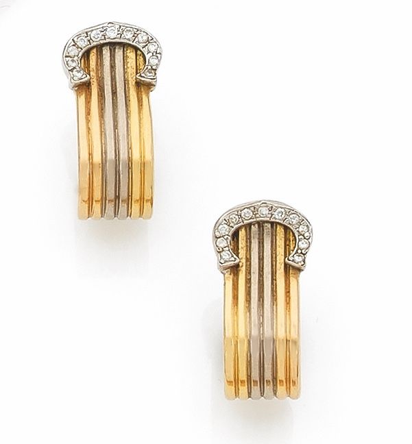 Null CARTIER. Pair of three gold ear CLIPS, the end finished with the "C" of the&hellip;