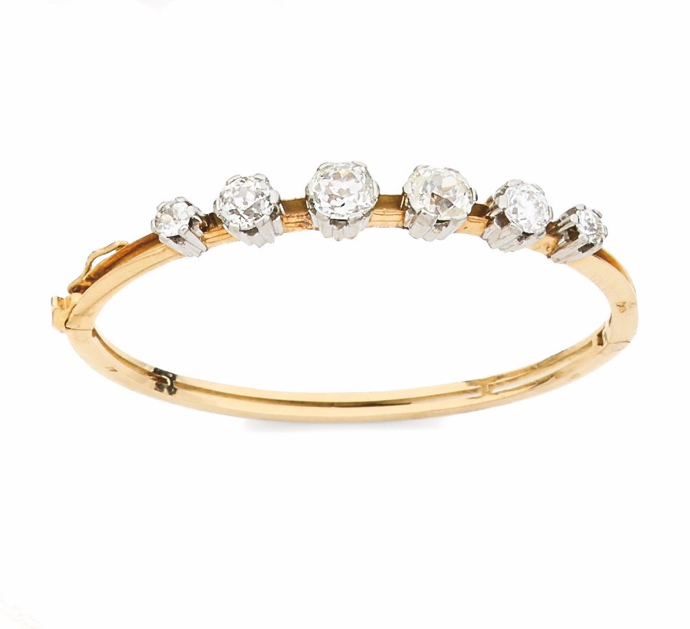 Null BRACELET in yellow gold 750 mils, opening, set with six old-cut diamonds, t&hellip;