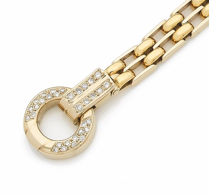Null 手镯，两块金子，花式网状，中间的环状图案镶嵌着钻石形成一个扣子。意大利作品 重量41克