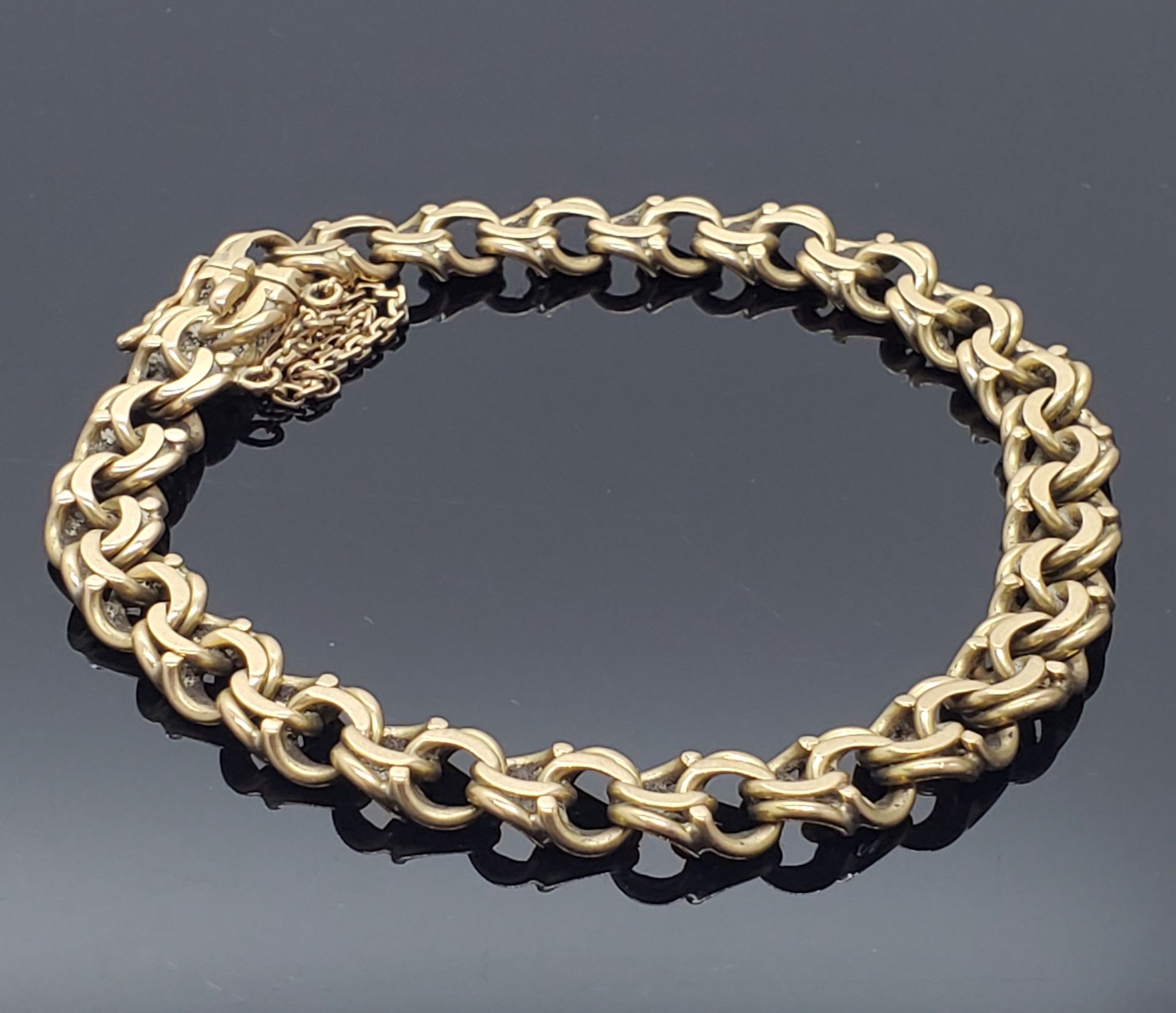 Null BRACELET en or jaune 750 mil. À maille fantaisie. Poids 23,7 g