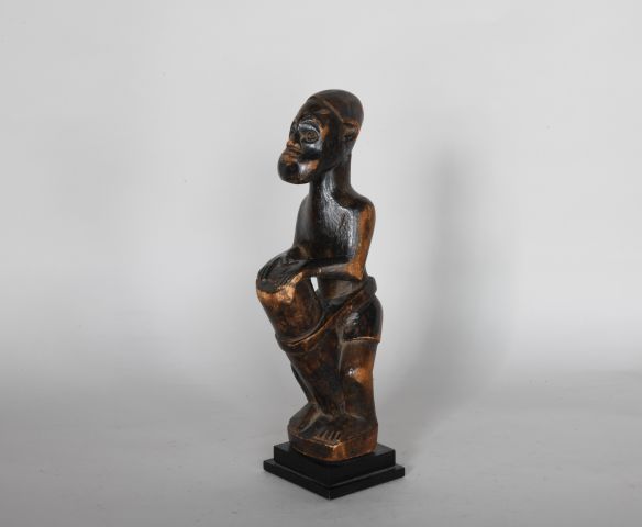 Null CONGO 

Statue de joueur de tambour en bois sculpté. 

XXe, dans le style d&hellip;