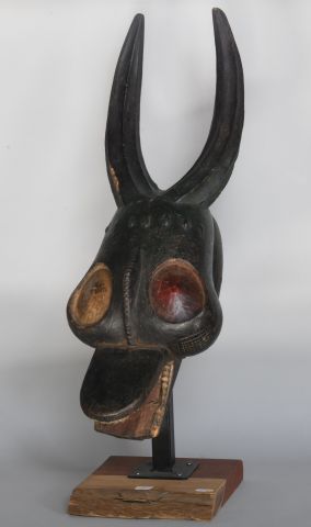 Null COTE D'IVOIRE 

Masque en bois polychrome

XXe, dans le style des GOURO 

H&hellip;