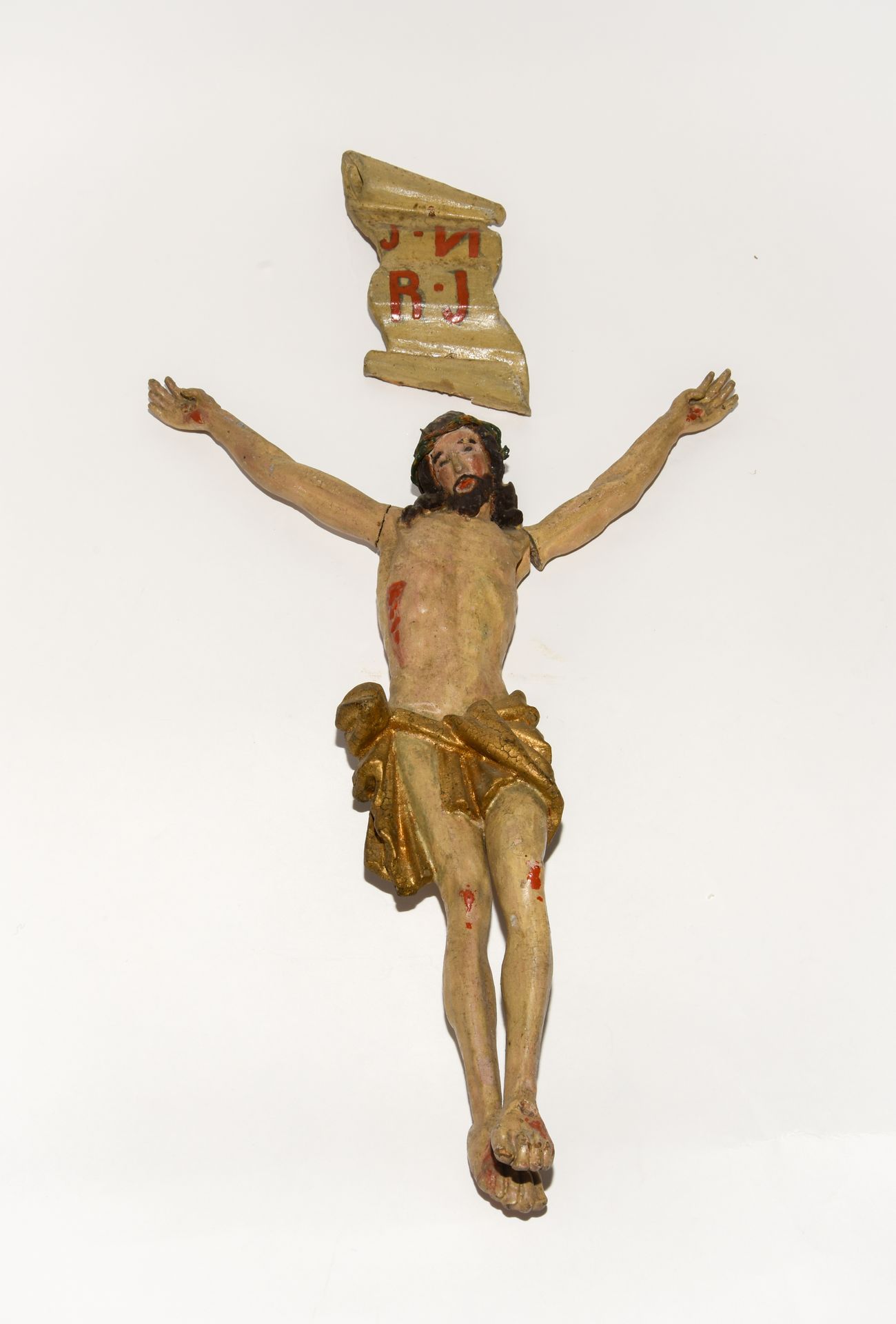 Null Cristo y su titulo en madera tallada policromada

Finales del siglo XVIII

&hellip;