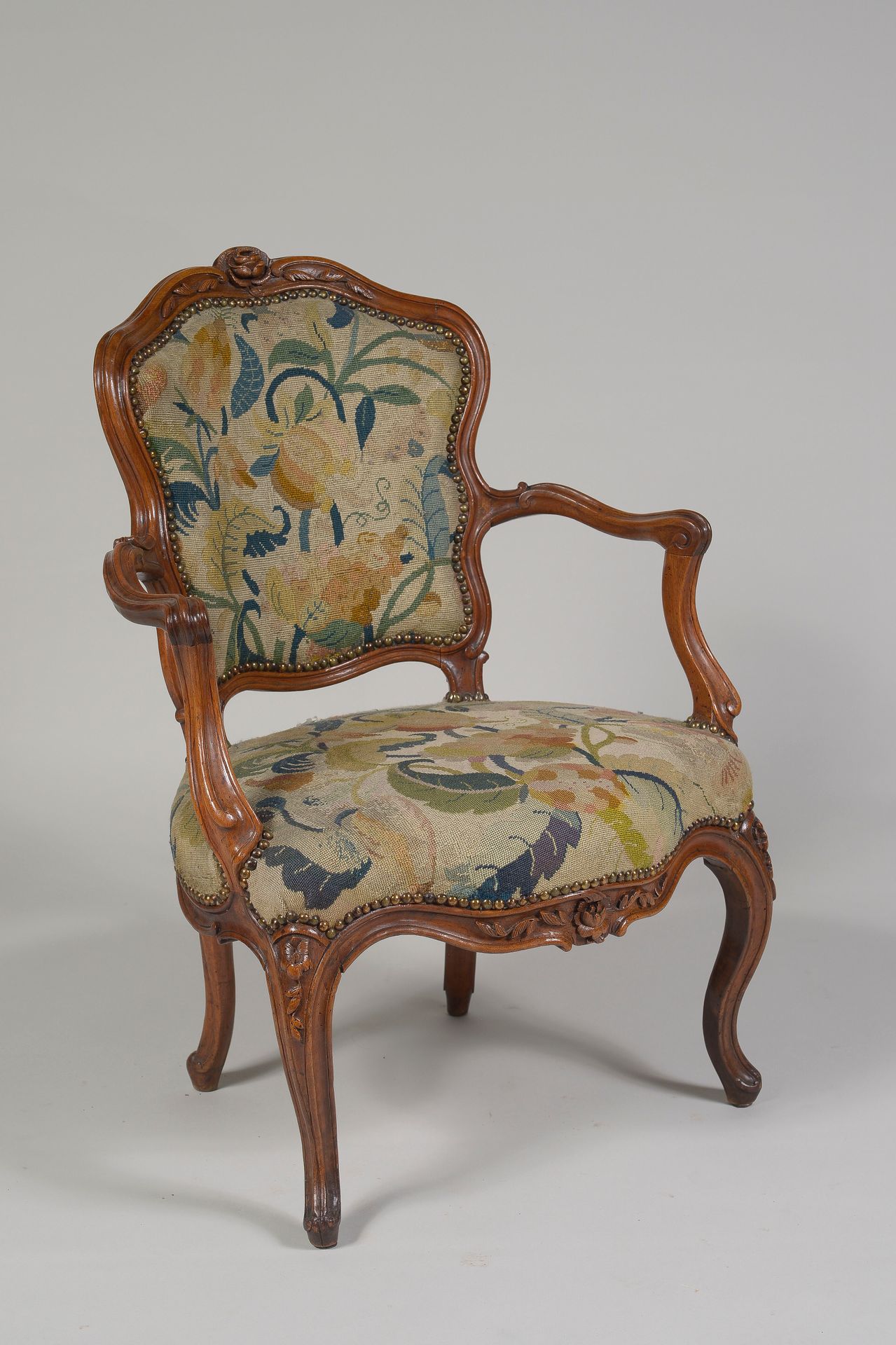 Null Attributed to NOGARET 

Cabriolet armchair 

in molded walnut, carved with &hellip;