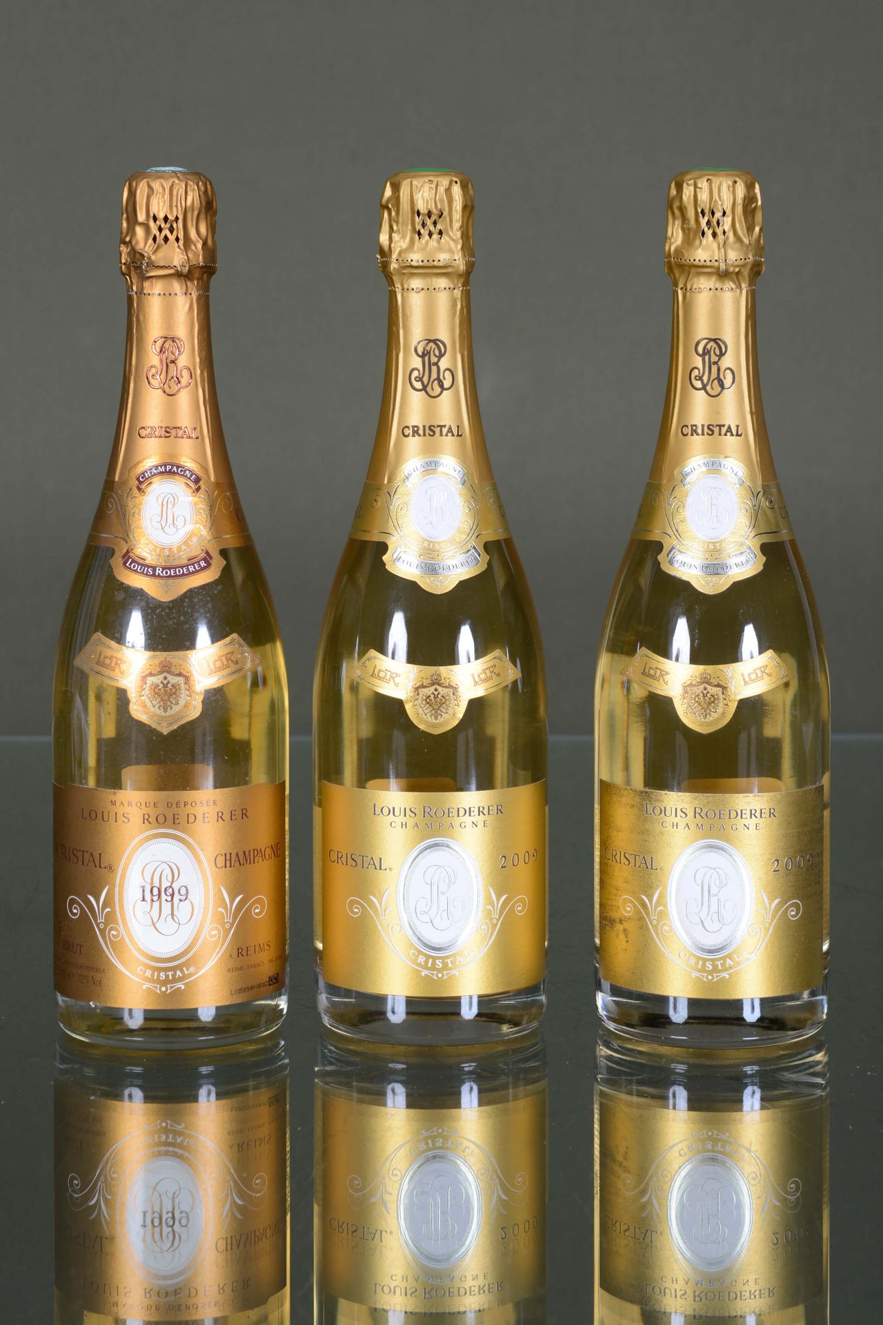 Champagne Cristal Roederer 1瓶，1999年+2瓶，2009年

状况报告：小污点，摩擦