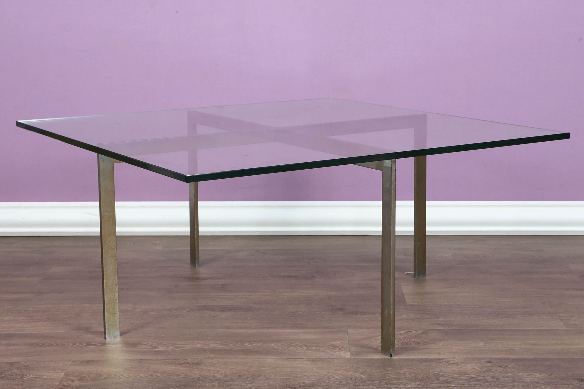 Ludwig Mies Van de Rohe (1886-1969) Coffee table Chromed metal base and clear gl&hellip;