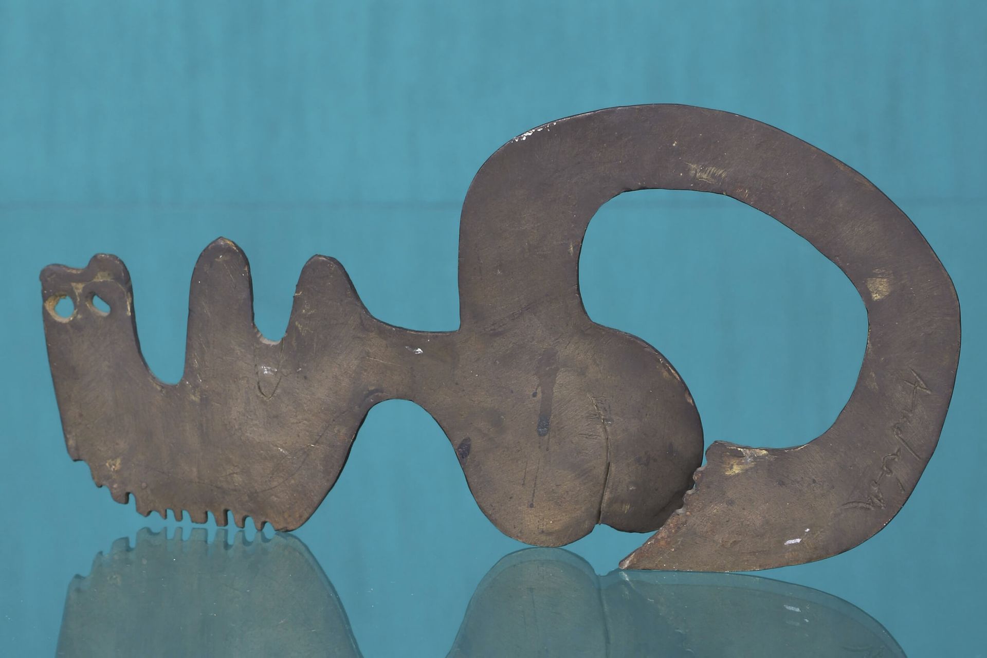 CONSTANTIN ANDREOU (1917-2007) 美人鱼 黄铜切割，签名 高12.5厘米，长26.5厘米 出处：>艺术家的遗产，雅典