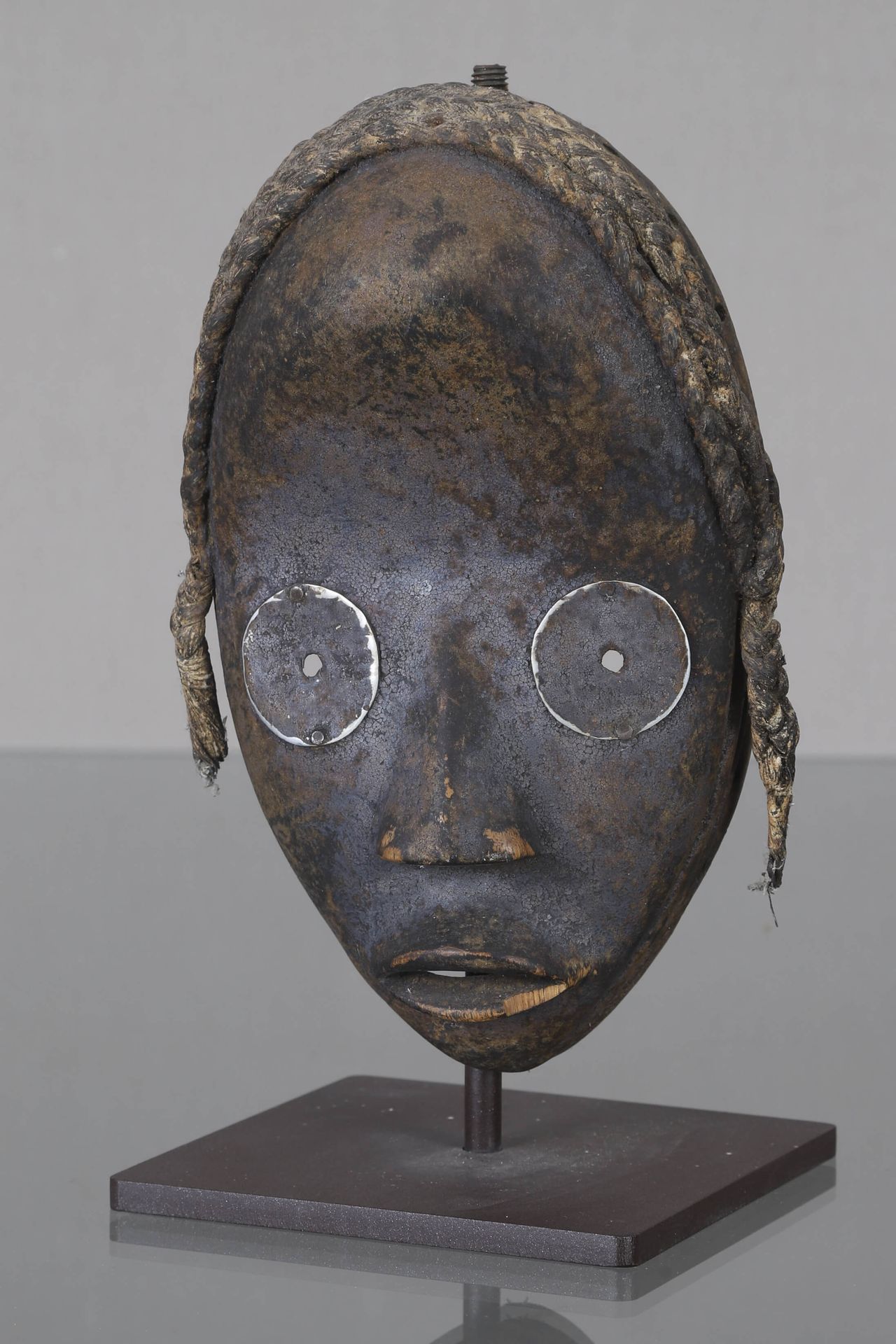 Côte d'Ivoire, Dan Anthropomorphic mask In sculpted wood, vegetable fibers for t&hellip;