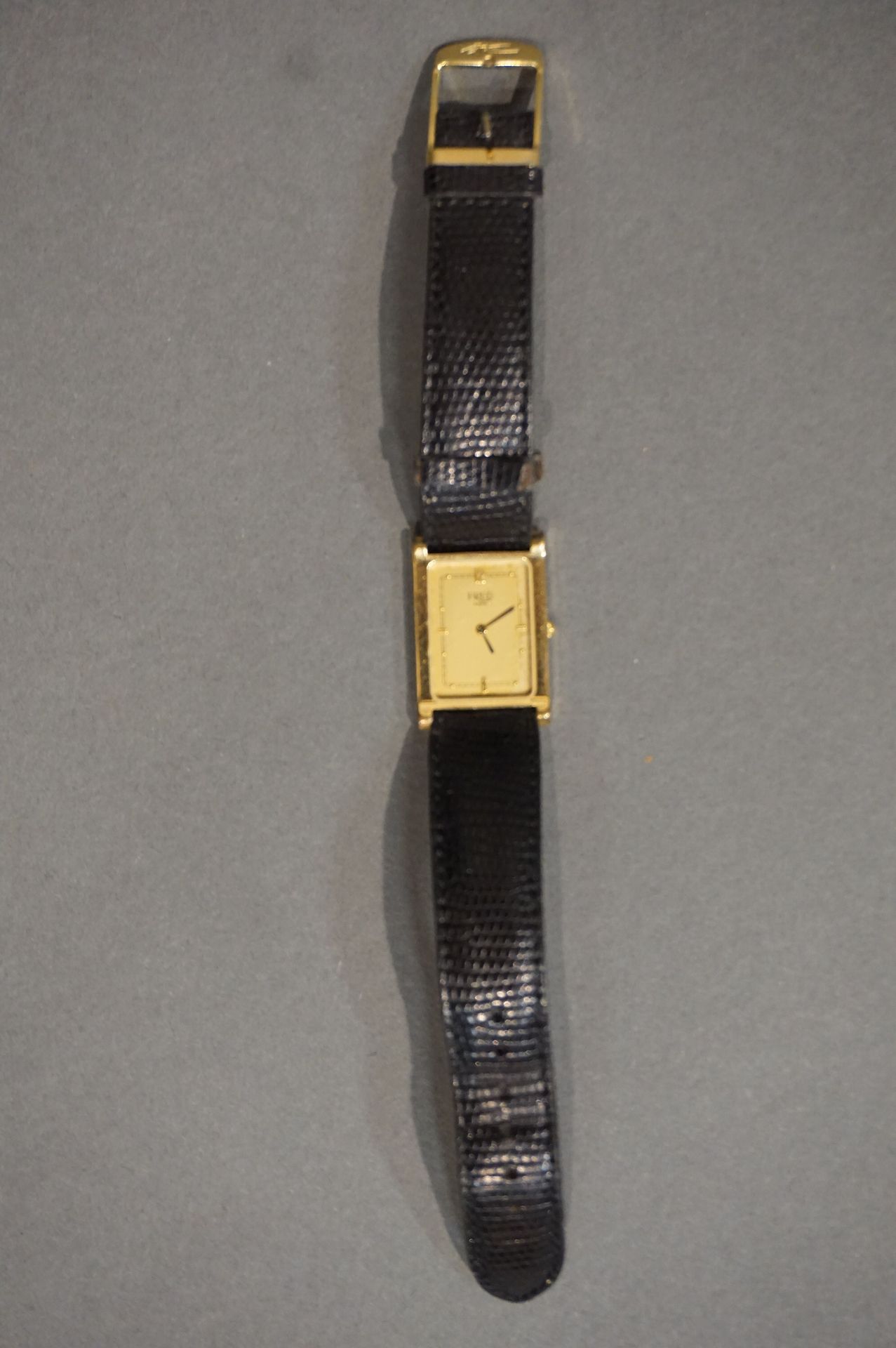 FRED Gilt metal watch from Fred with used lizard strap.