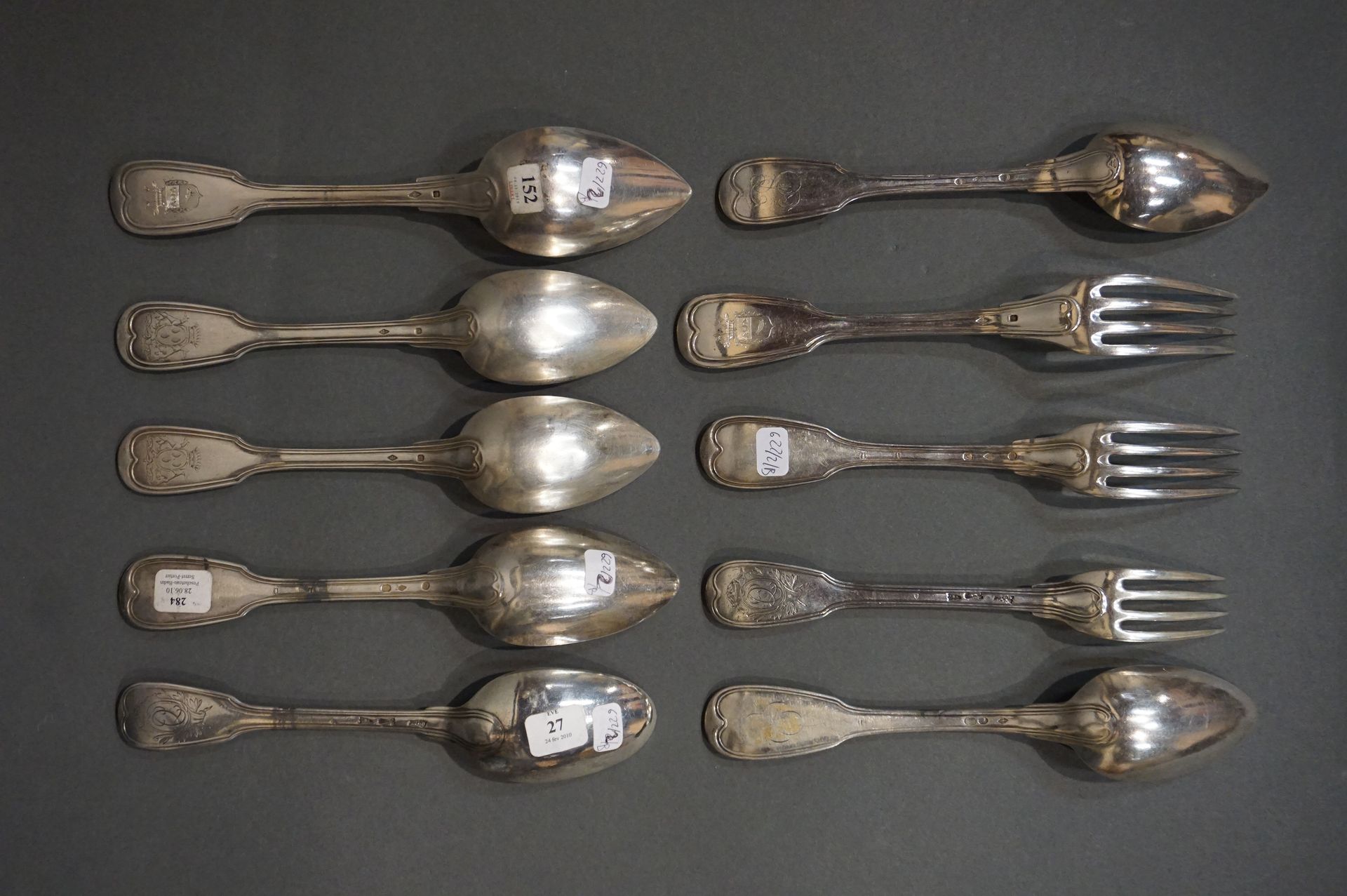 COUVERTS Seven large spoons and three large forks in silver contour, some emblaz&hellip;