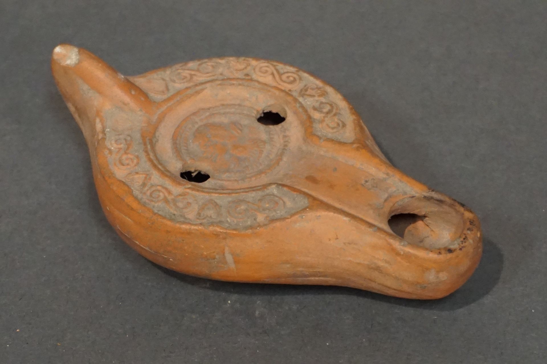 Null Oil lamp with a channel spout decorated with a medallion representing a fem&hellip;