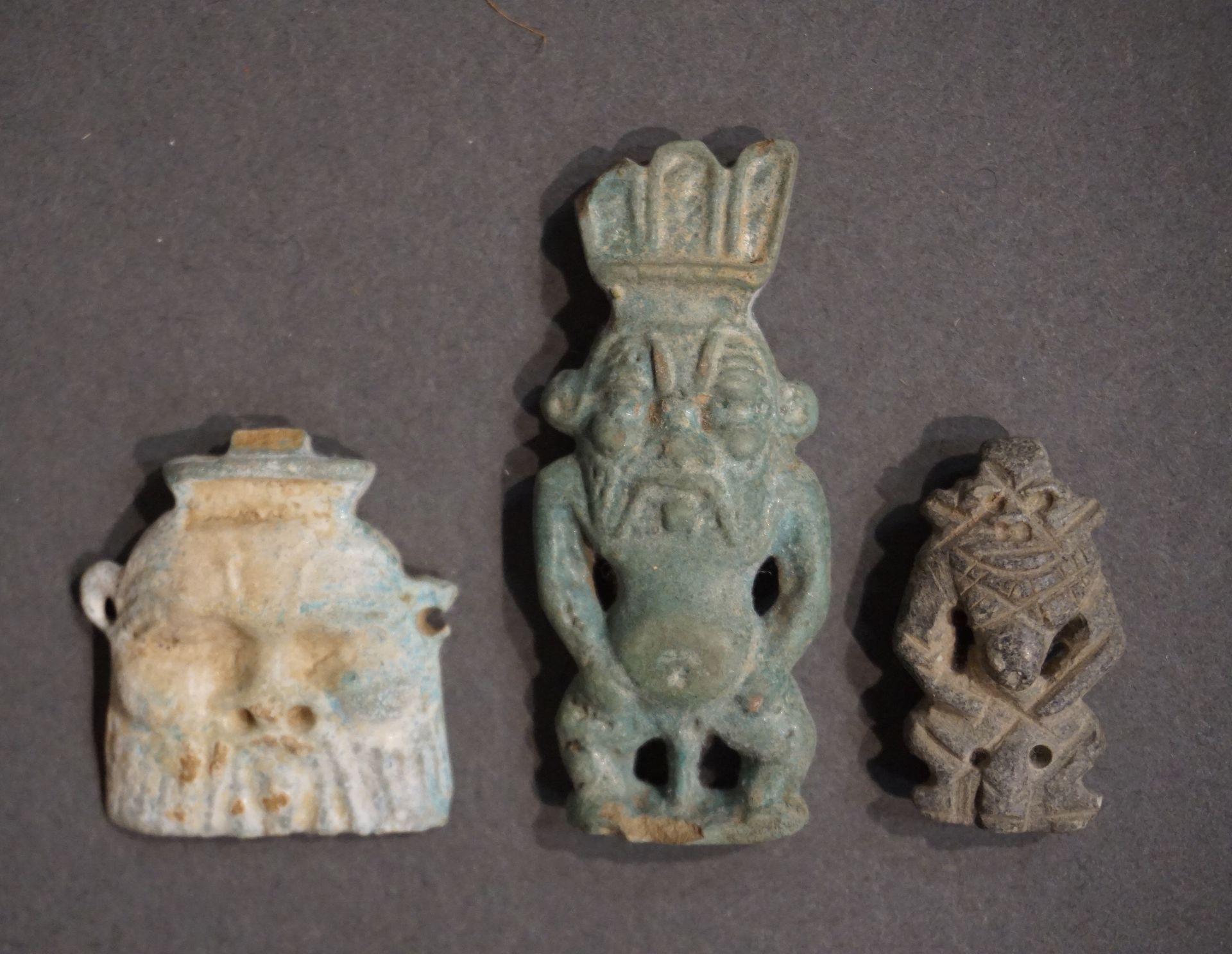 Null Lot of three amulets including a head of god Bès and two gods Bès standing.&hellip;