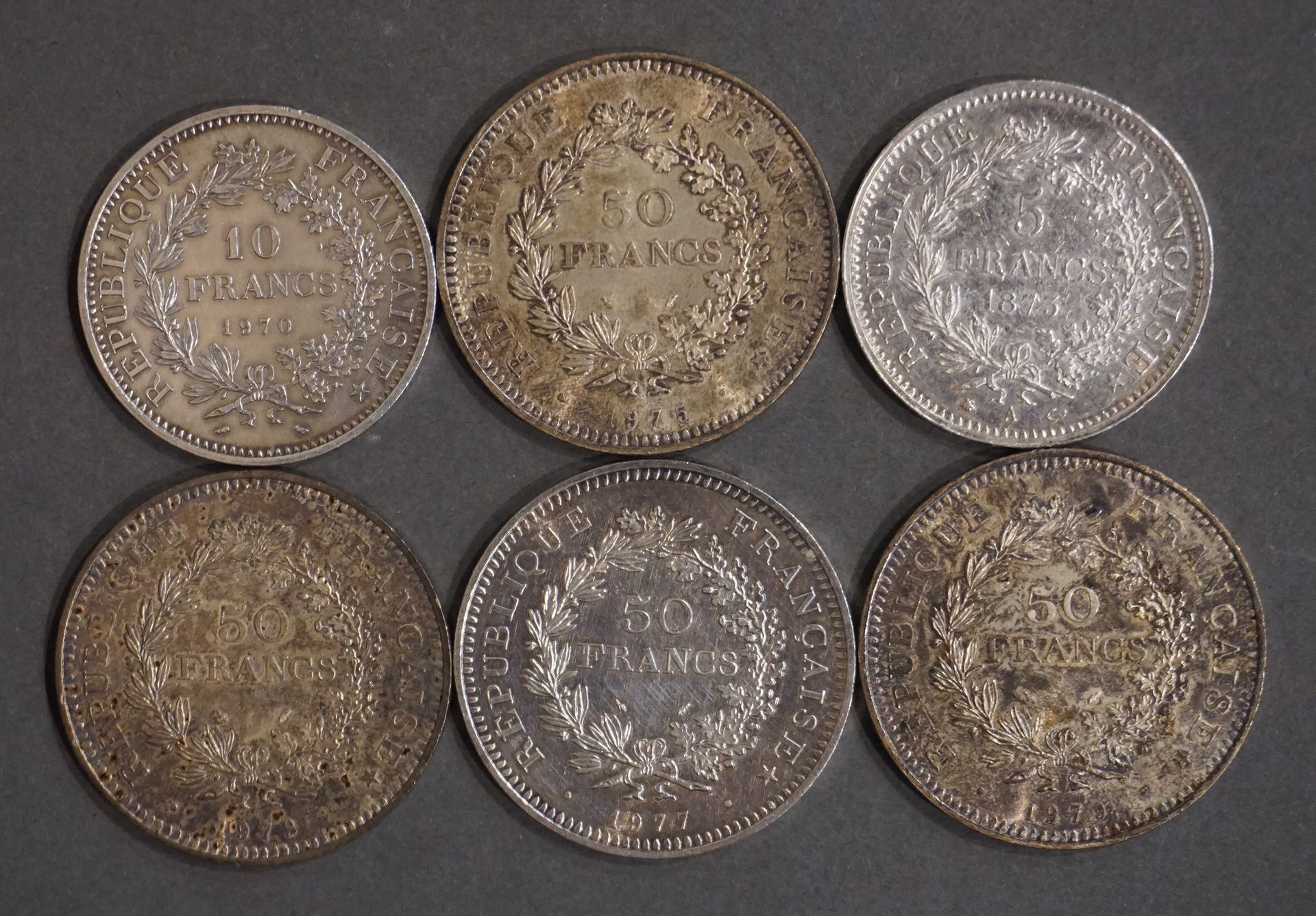 Null Lot of silver coins: four of 50 French francs, one of 10 French francs and &hellip;