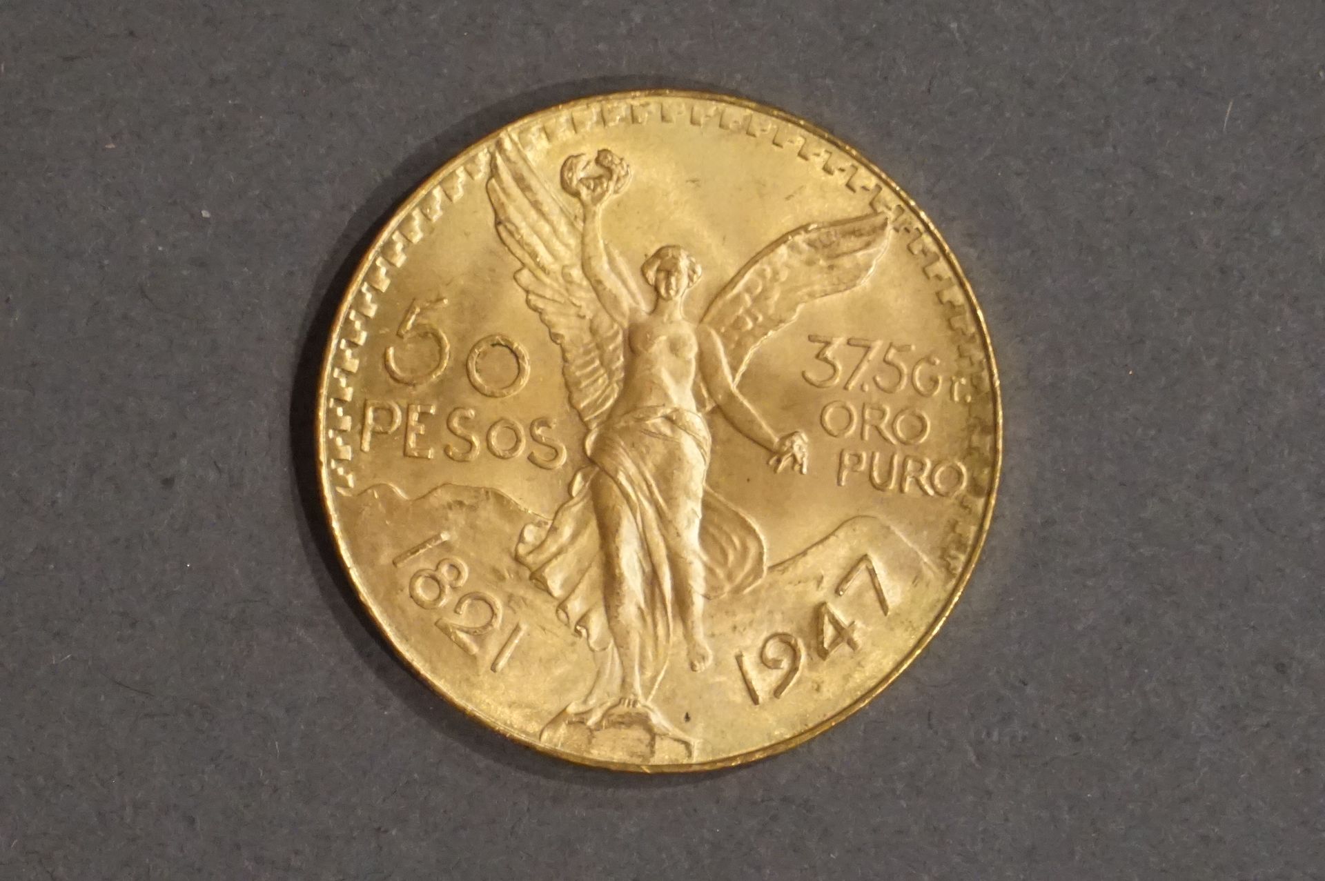 Null Una moneta d'oro da cinquanta pesos messicani (41,6 gr.)