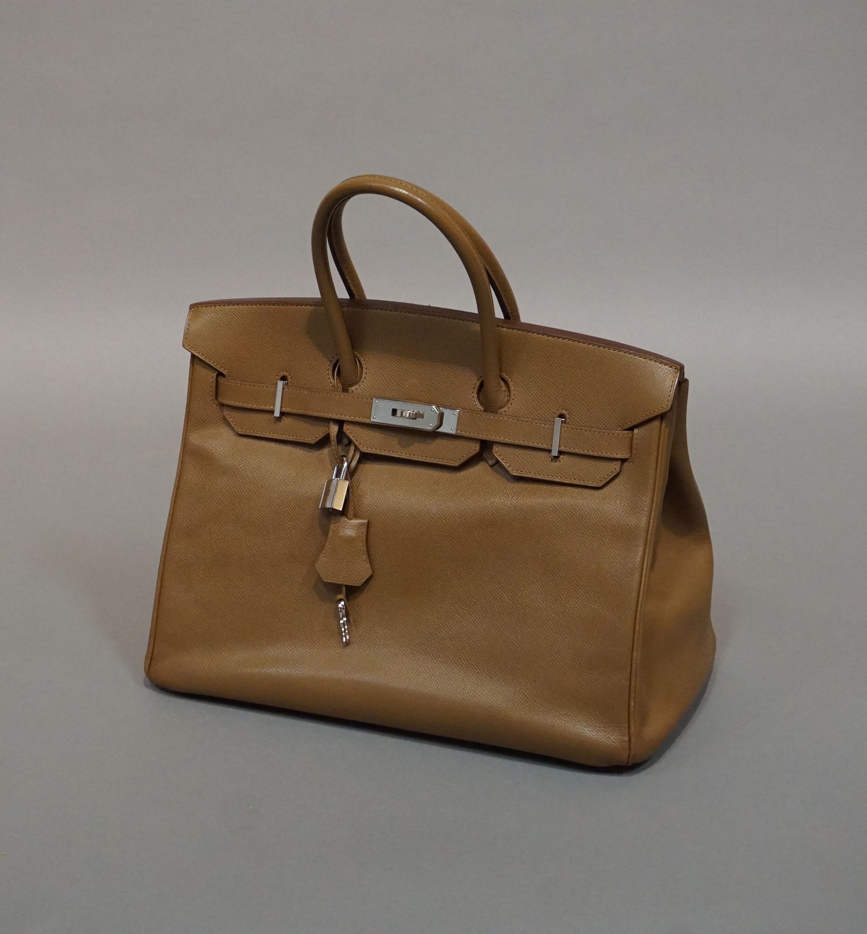 HERMES Birkin" handbag in beige grained leather. With padlock (very good conditi&hellip;
