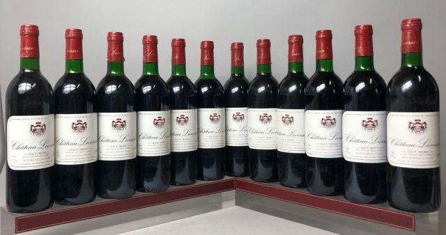 Null 12 bouteilles CHÂTEAU LIVERSAN - Haut Médoc. 1989. Caisse bois. 6 niveaux l&hellip;