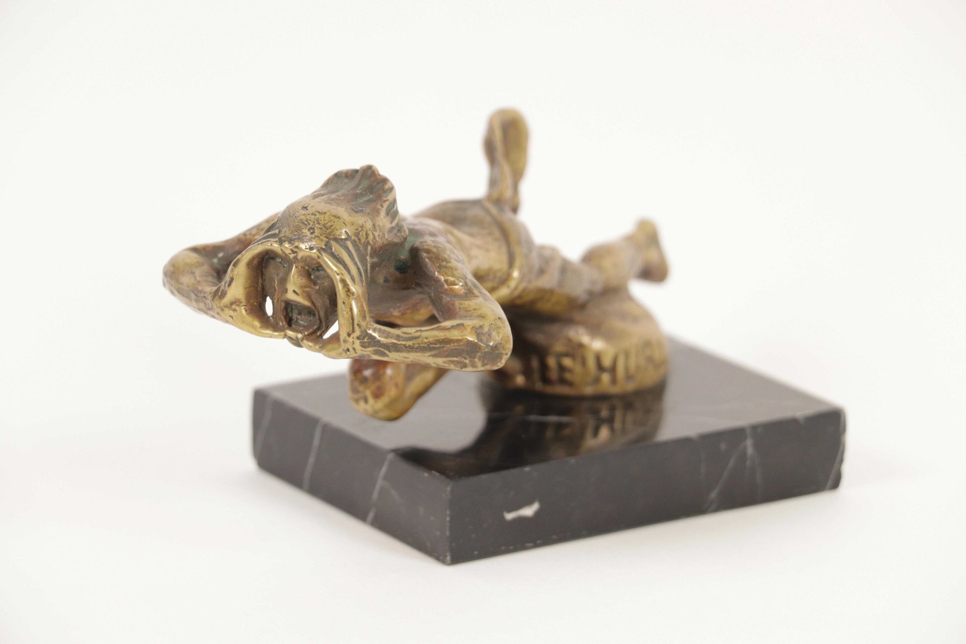 Null 
Automobile mascot. The Howler, bronze. L : 16.5 cm