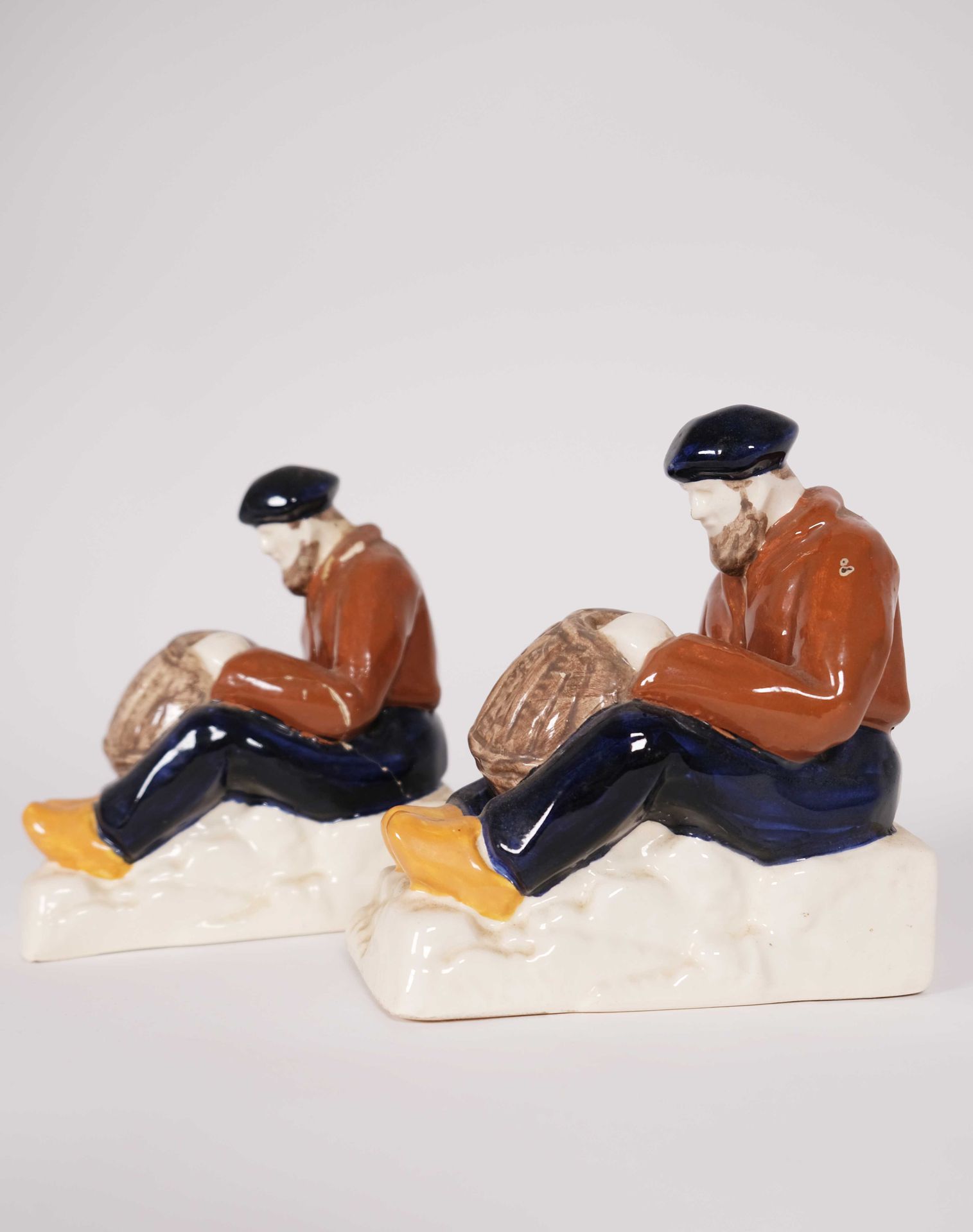 Null Pair of bookends in earthenware HB Quimper representing sailors in the trap&hellip;
