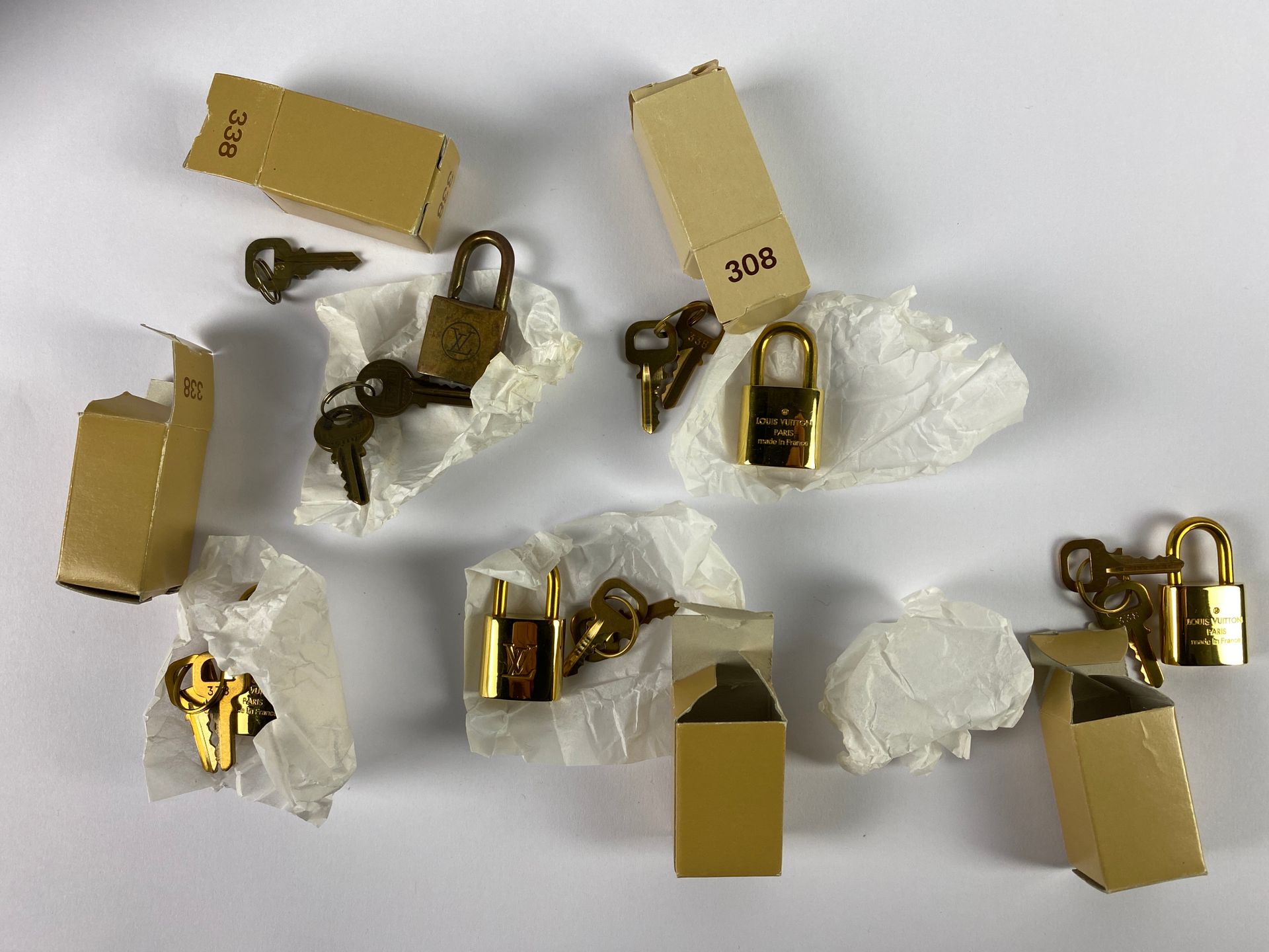 LOT Louis VUITTON : Five padlocks (one oxidized)
