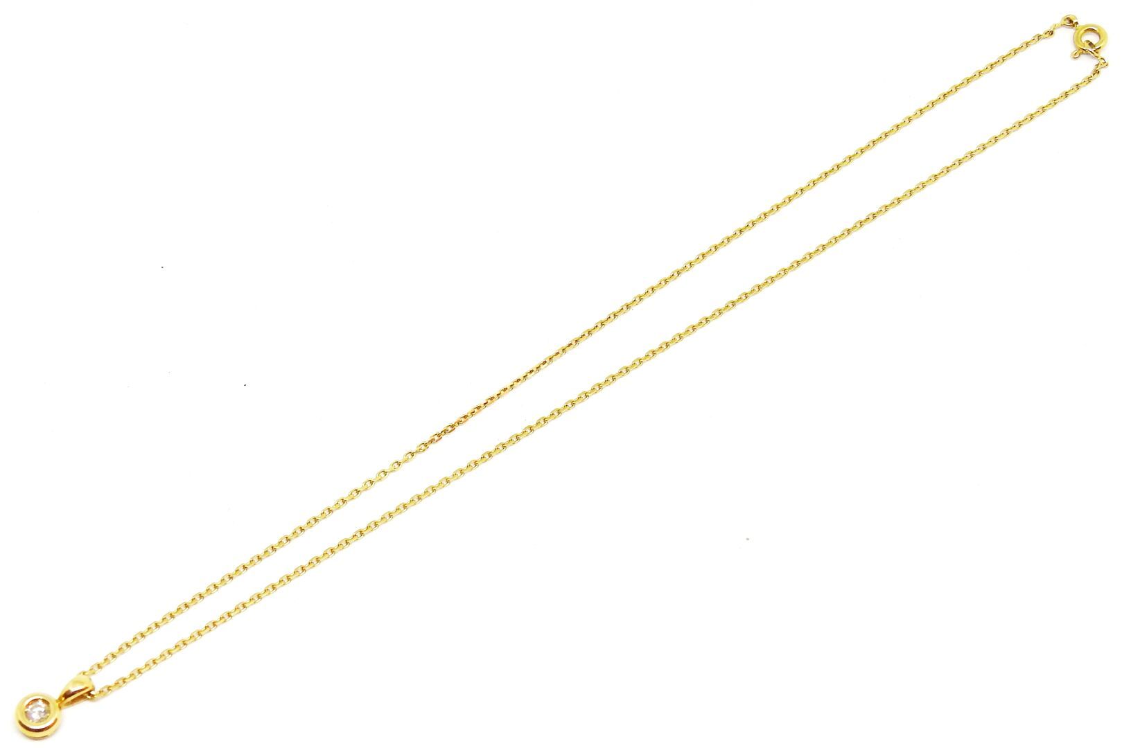Null 18K金项链和吊坠，镶有一颗明亮式切割钻石

总长度：21厘米

总重量：3.96克