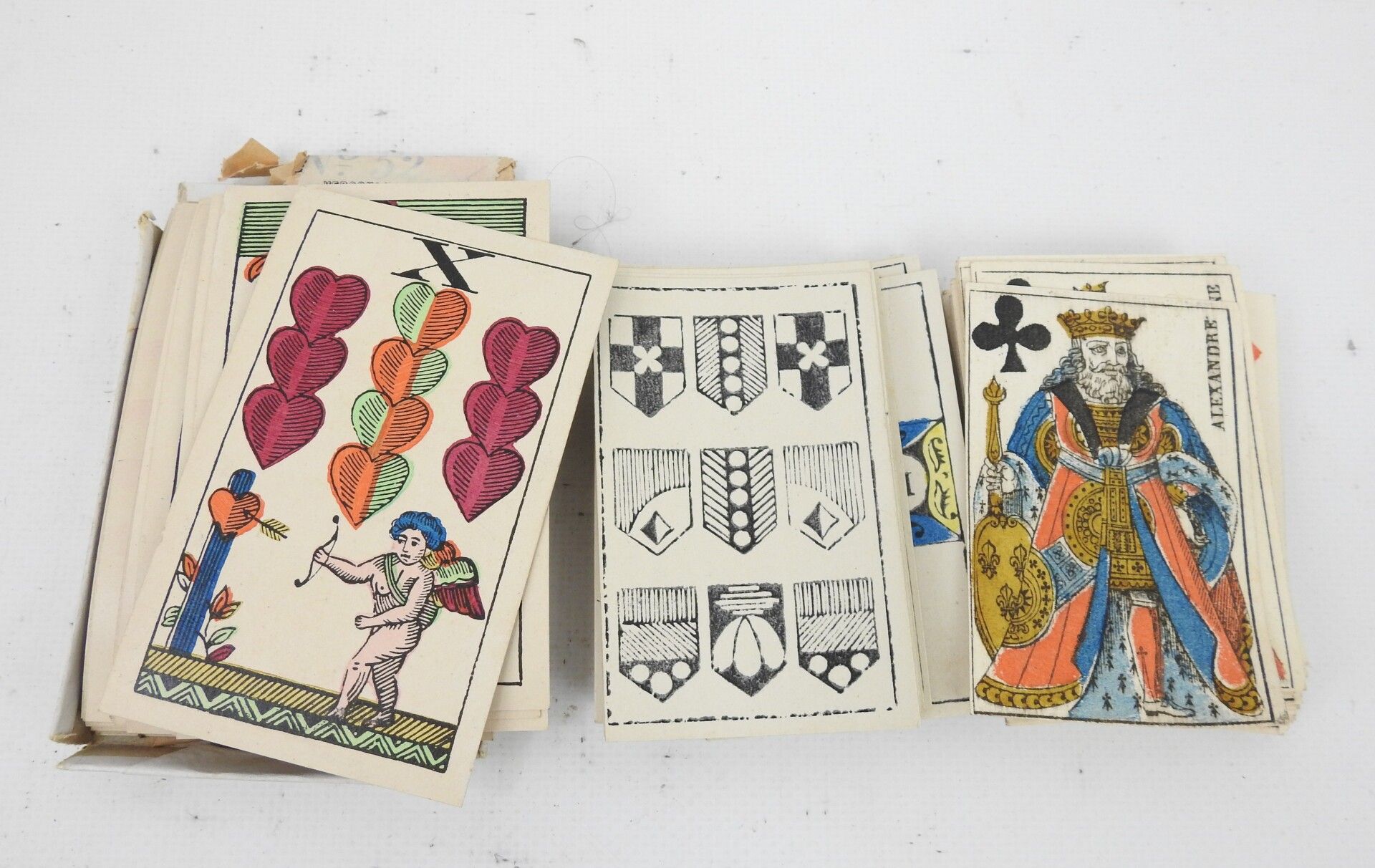 Null LOT de trois jeux de cartes début XXème. Usures;