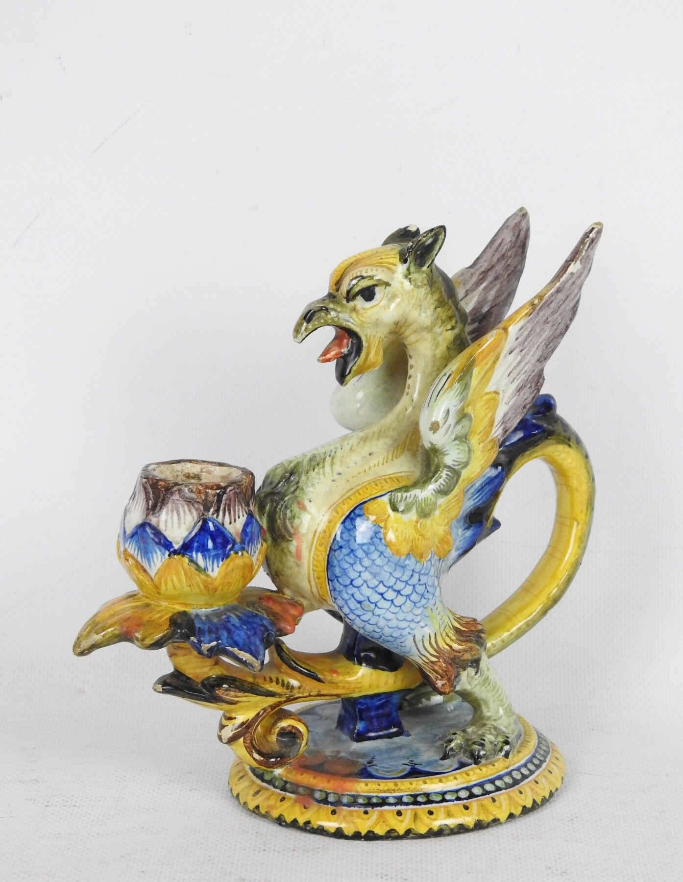 Null CANDLE hand in earthenware polychrome forming a winged chimera. Italian wor&hellip;