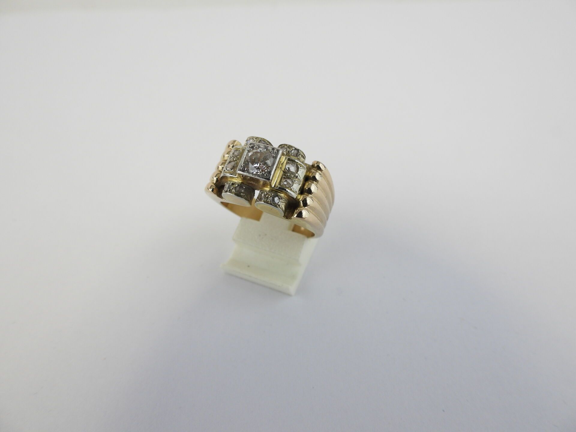 Null Ring TANK in yellow gold 750 thousandths decorated with a central diamond (&hellip;