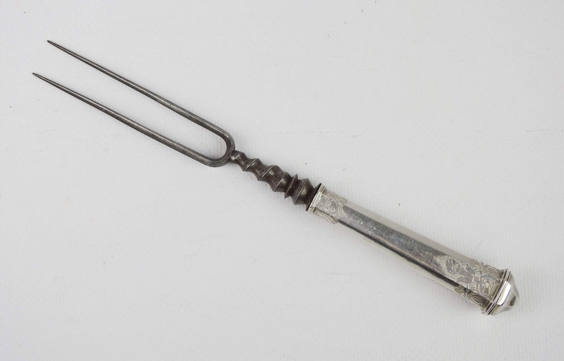 Null Two pronged steel fork with octagonal silver handle decorated with lambrequ&hellip;