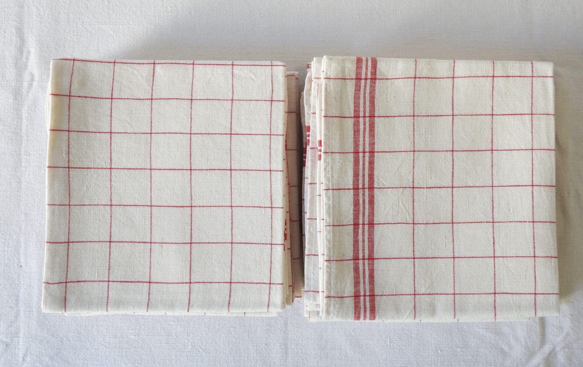 Null Twelve red checkered tea towels.