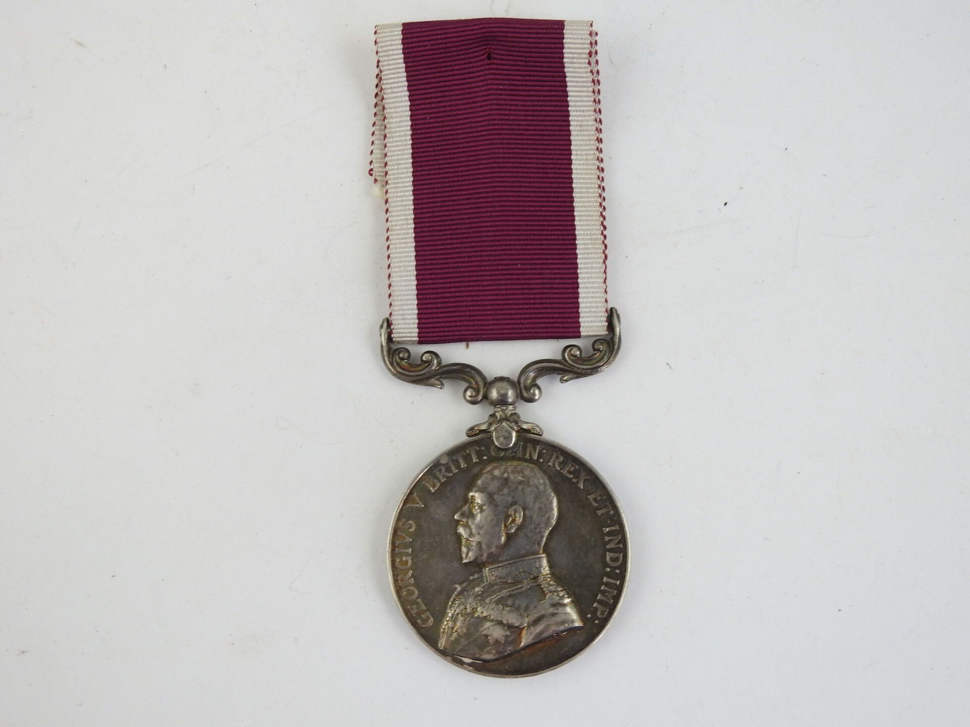 Null 装饰品。英国。乔治五世统治时期（1910-1936）的长期服务和良好行为奖章，授予二等兵F.T.。教会，陆军服务团（ASC），有绶带。ABE