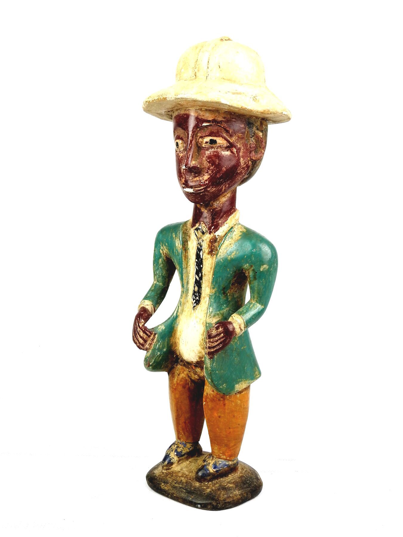 Null 刚果。
上漆的硬木。
戴着殖民时期头盔的丹迪雕像。
高度：40厘米。
略有磨损。