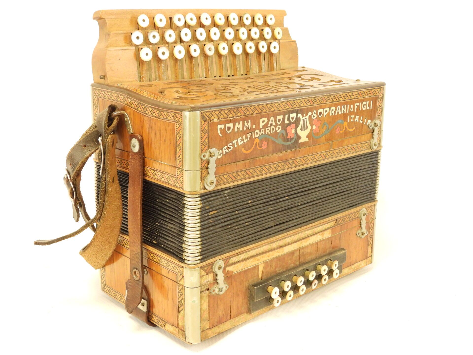 Null ACCORDEON with inlaid decoration of floral scrolls marked Comm. PAOLO SOPRA&hellip;