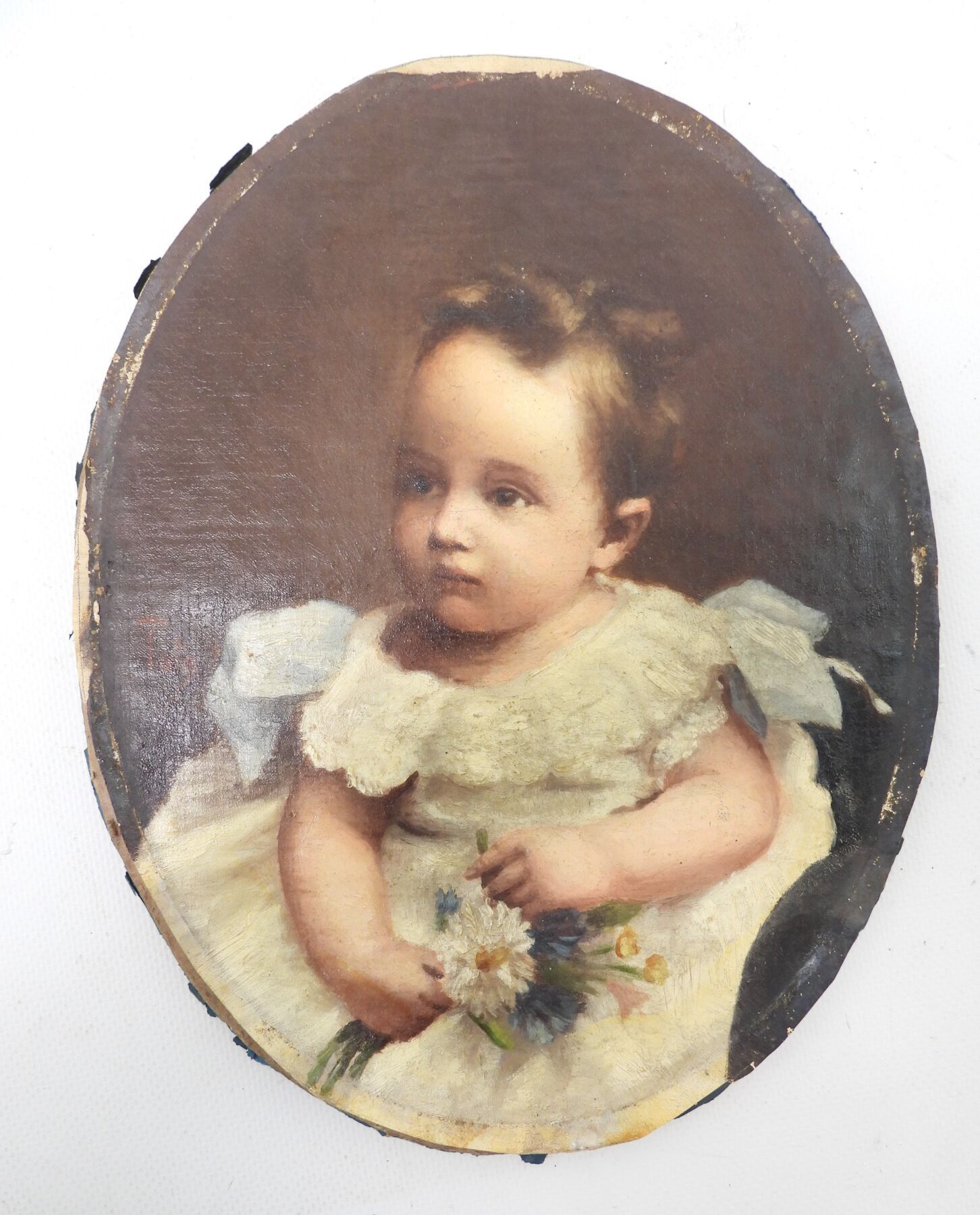 Null 19世纪法国学校：一个年轻孩子的肖像。布面油画，左侧有签名 "塔塔"。28 x 22 cm