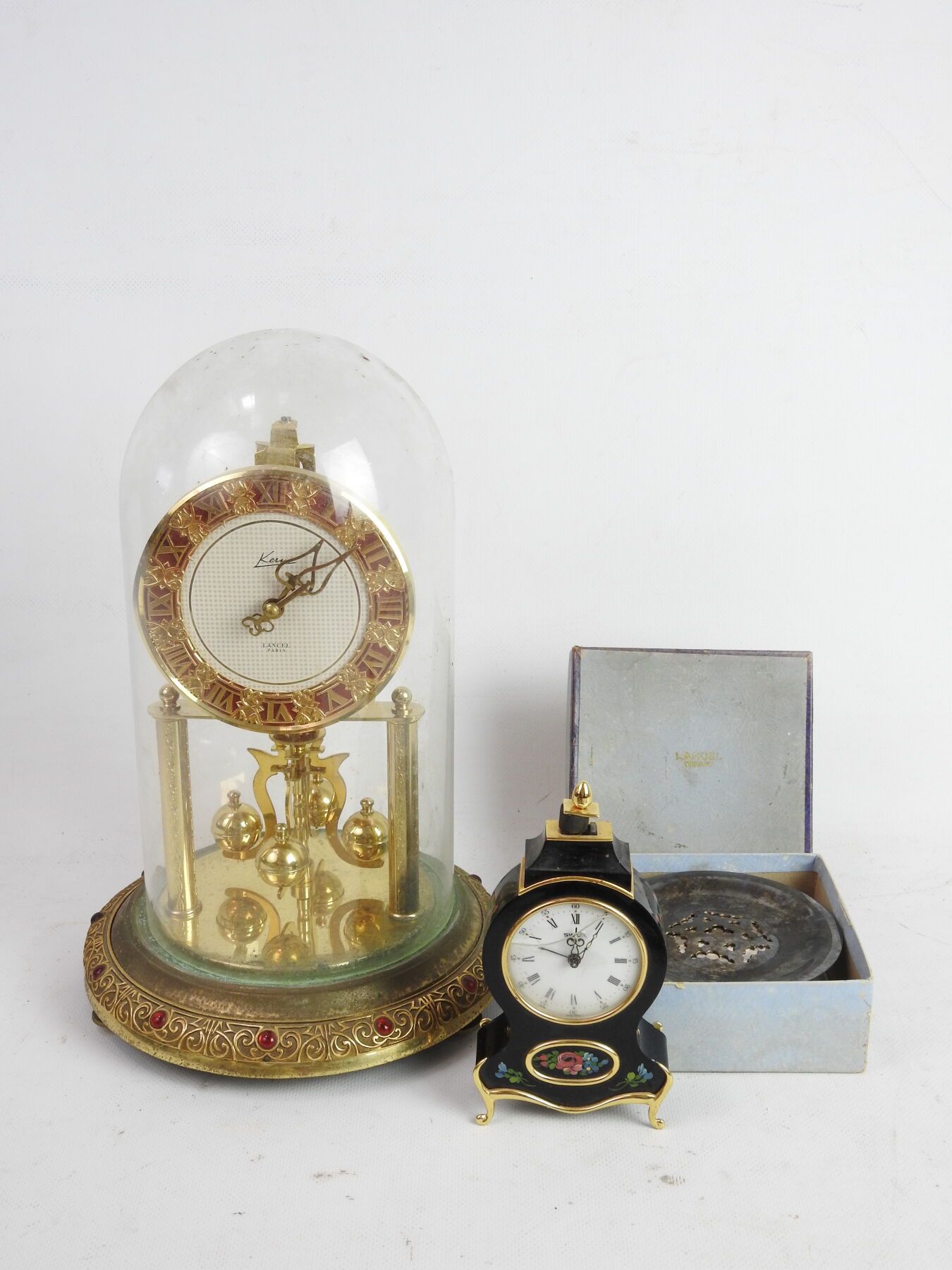 Null LANCEL - Paris : Kern clock with perpetual movement in gilded metal and und&hellip;