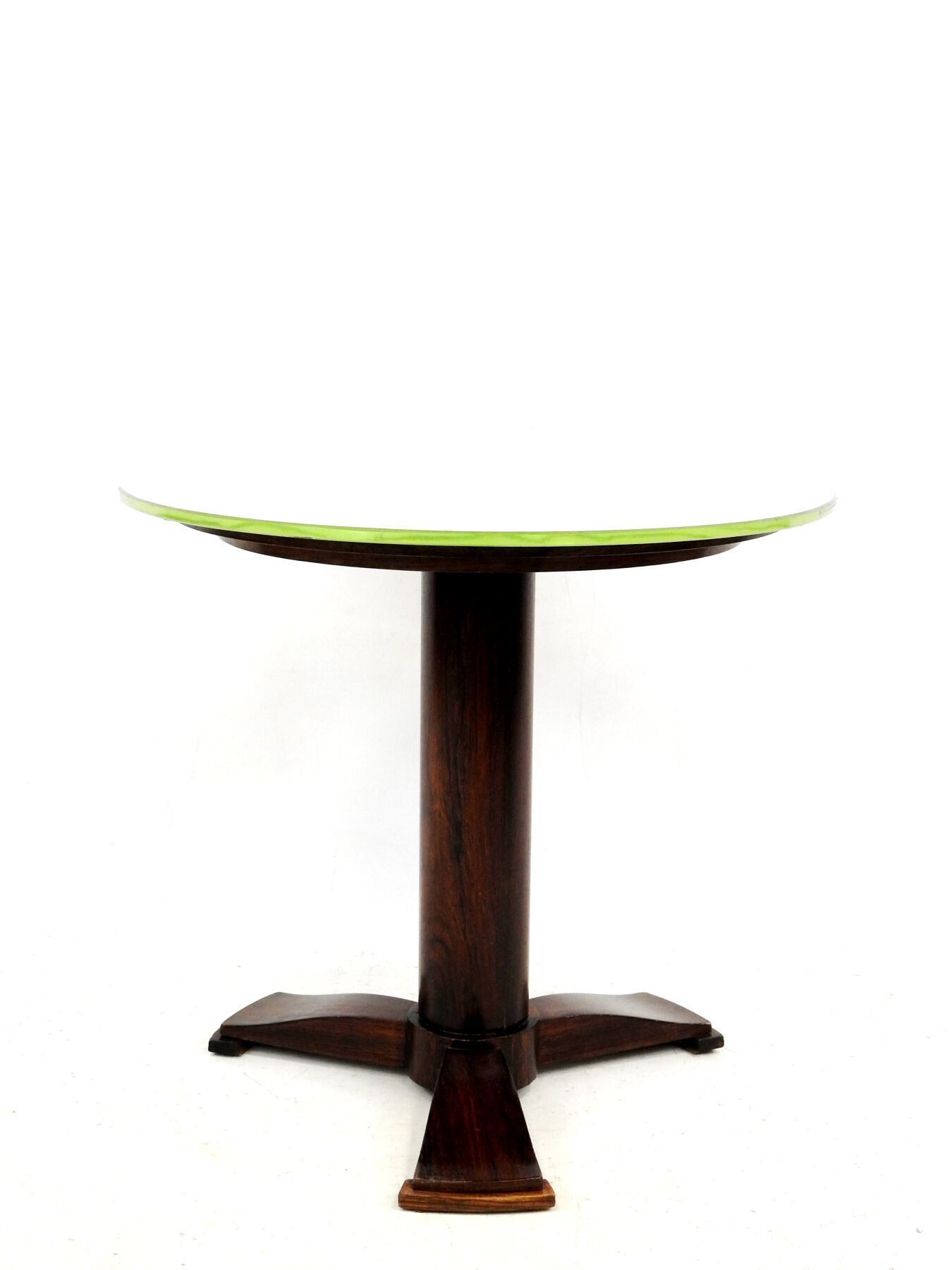 Null 归功于朱尔斯-勒鲁（1883-1961）。

一个紫檀木贴面的 "衬垫 "基座桌，圆形镜面由一个圆柱形轴支撑，有三个滑板脚。编号为P 9183。没有盖&hellip;