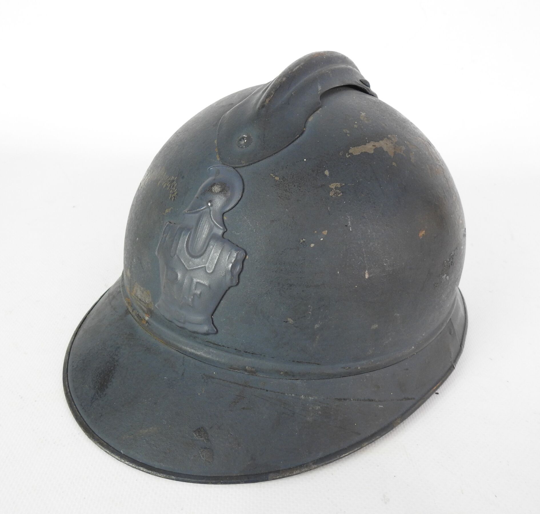 Null GENIE.阿德里安头盔，1915年的钢制头盔，工厂的蓝色地平线哑光，武器的正面标志，黑色和黄褐色皮革的第二类内饰帽，特别漂亮的状态，2个铝制的调整槽&hellip;