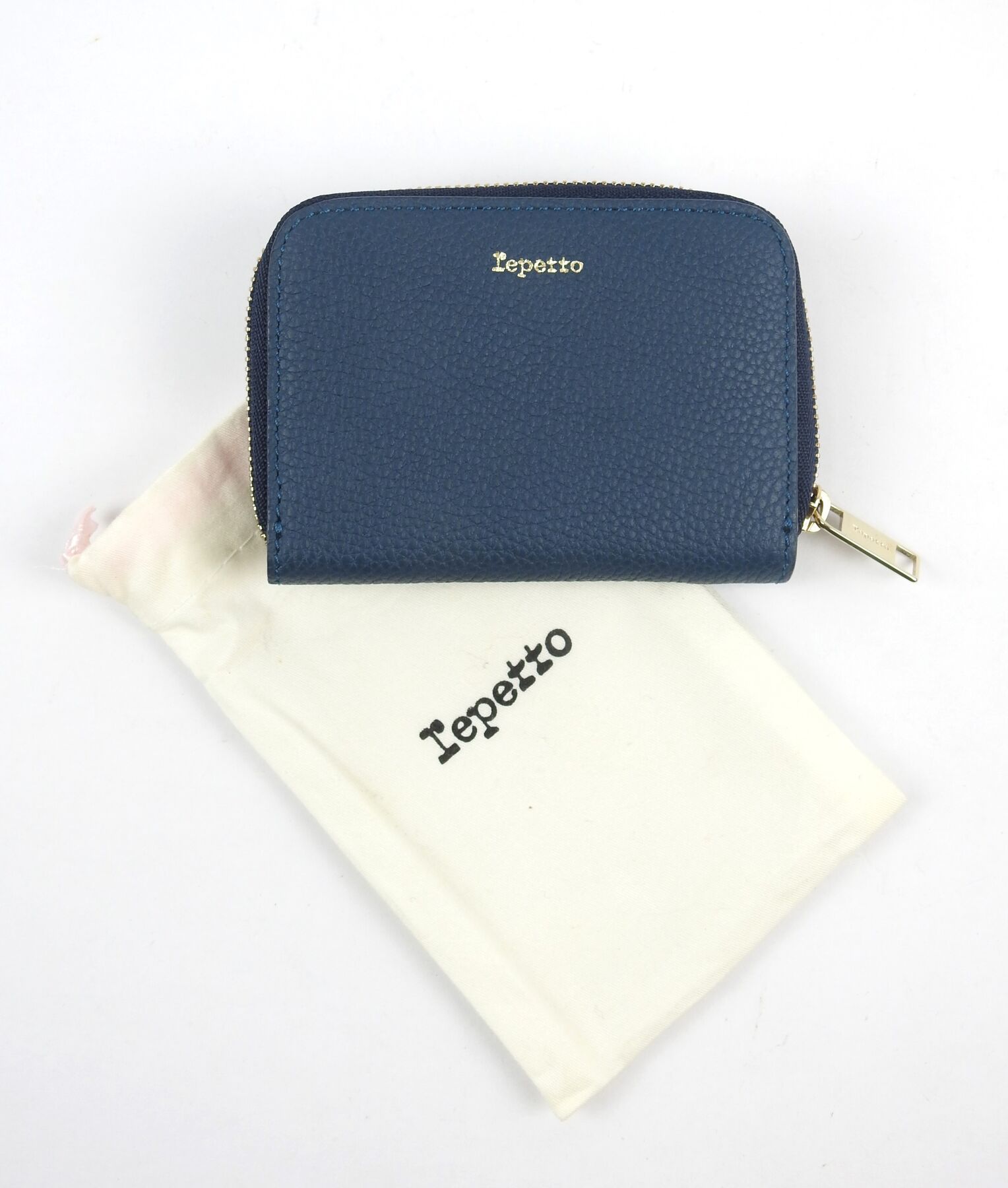Null LEPETTO. Purse in blue grained leather. With its pouch.