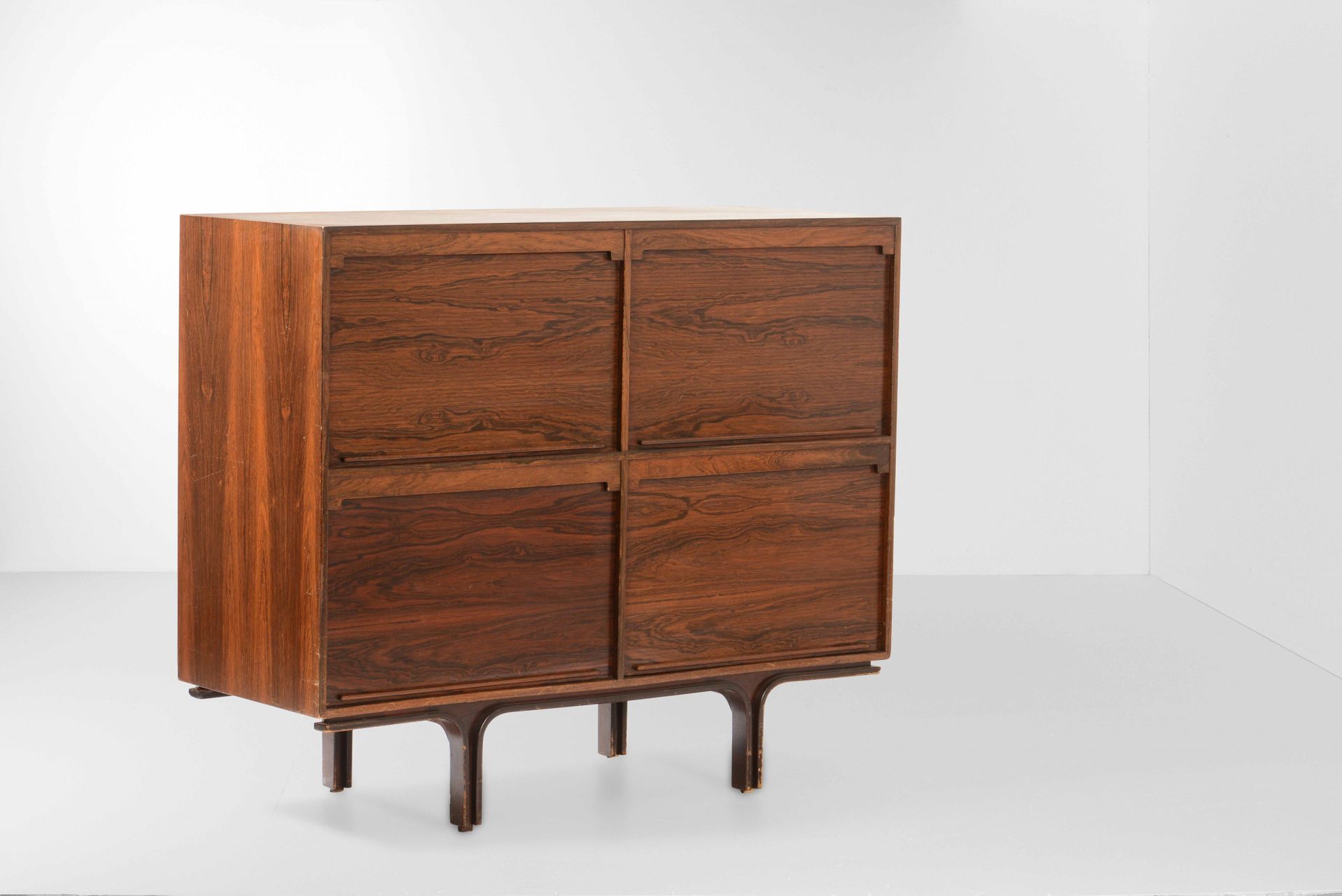 Gianfranco Frattini, Sideboard with wooden structure and shuttered compartments.&hellip;
