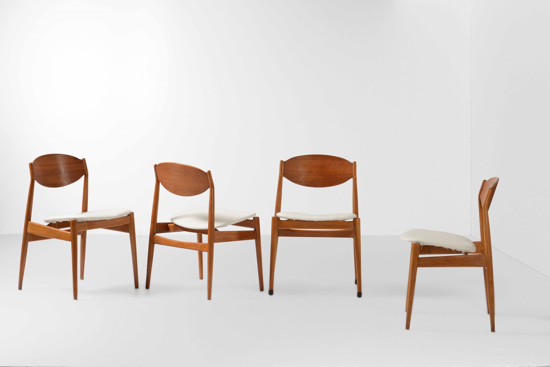 ISA, Quattro sedie con struttura in legno e rivestimenti in tessuto. Prod. ISA, &hellip;